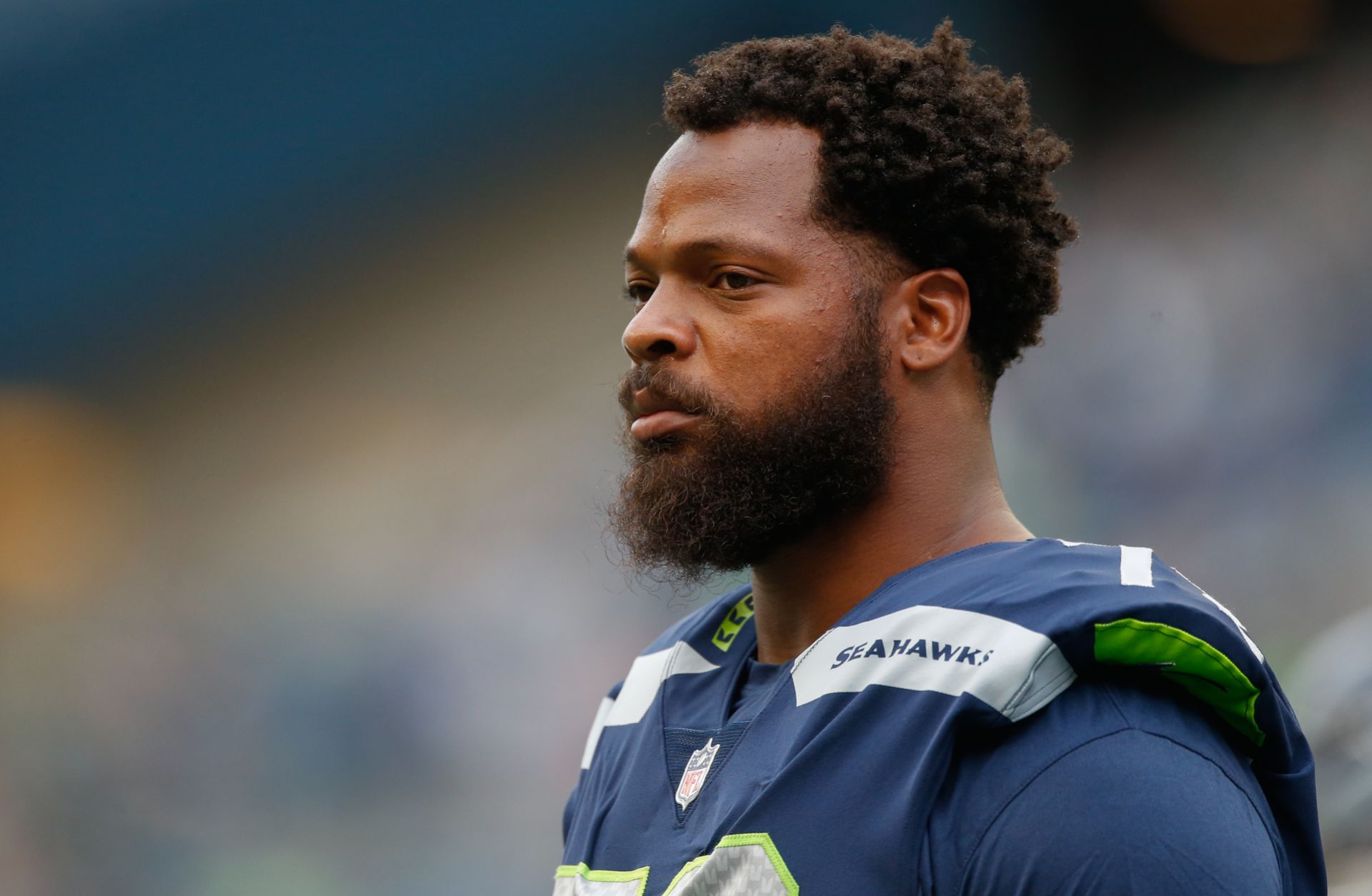 Defensive end Michael Bennett of the Seattle Seahawks looks on prior to the game against the Minnesota Vikings on Aug. 18, 2017, in Seattle, Washington.