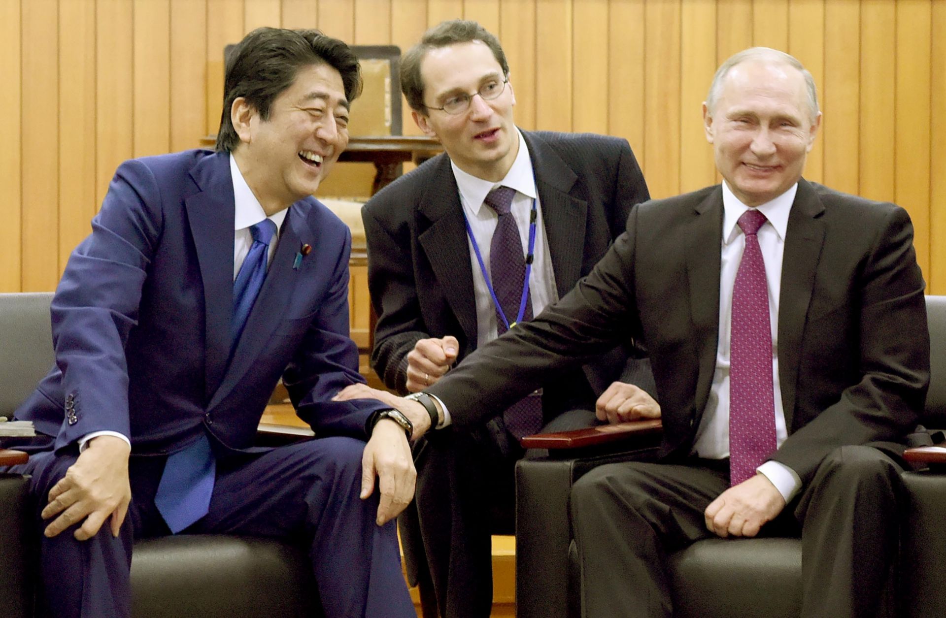 Russian President Vladimir Putin (right) and Japanese Prime Minister Shinzo Abe (left) share a laugh at the headquarters of worldwide judo community, the Kodokan Judo Institute, on Dec. 16, 2016.