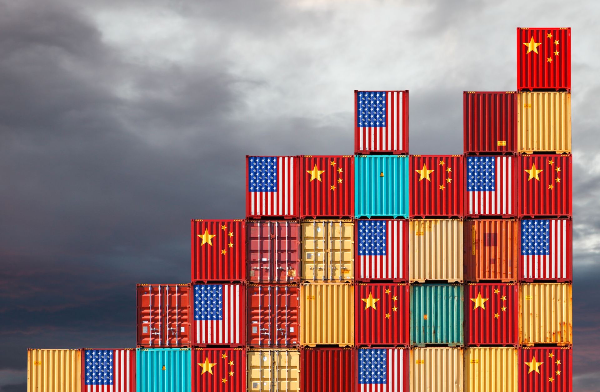 Cargo containers painted with Chinese and U.S. flags.