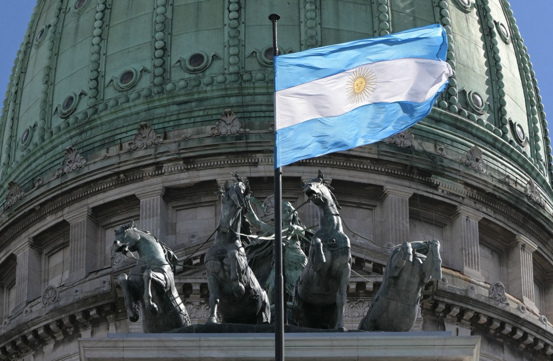 Argentina's flag flutters at the Congress.