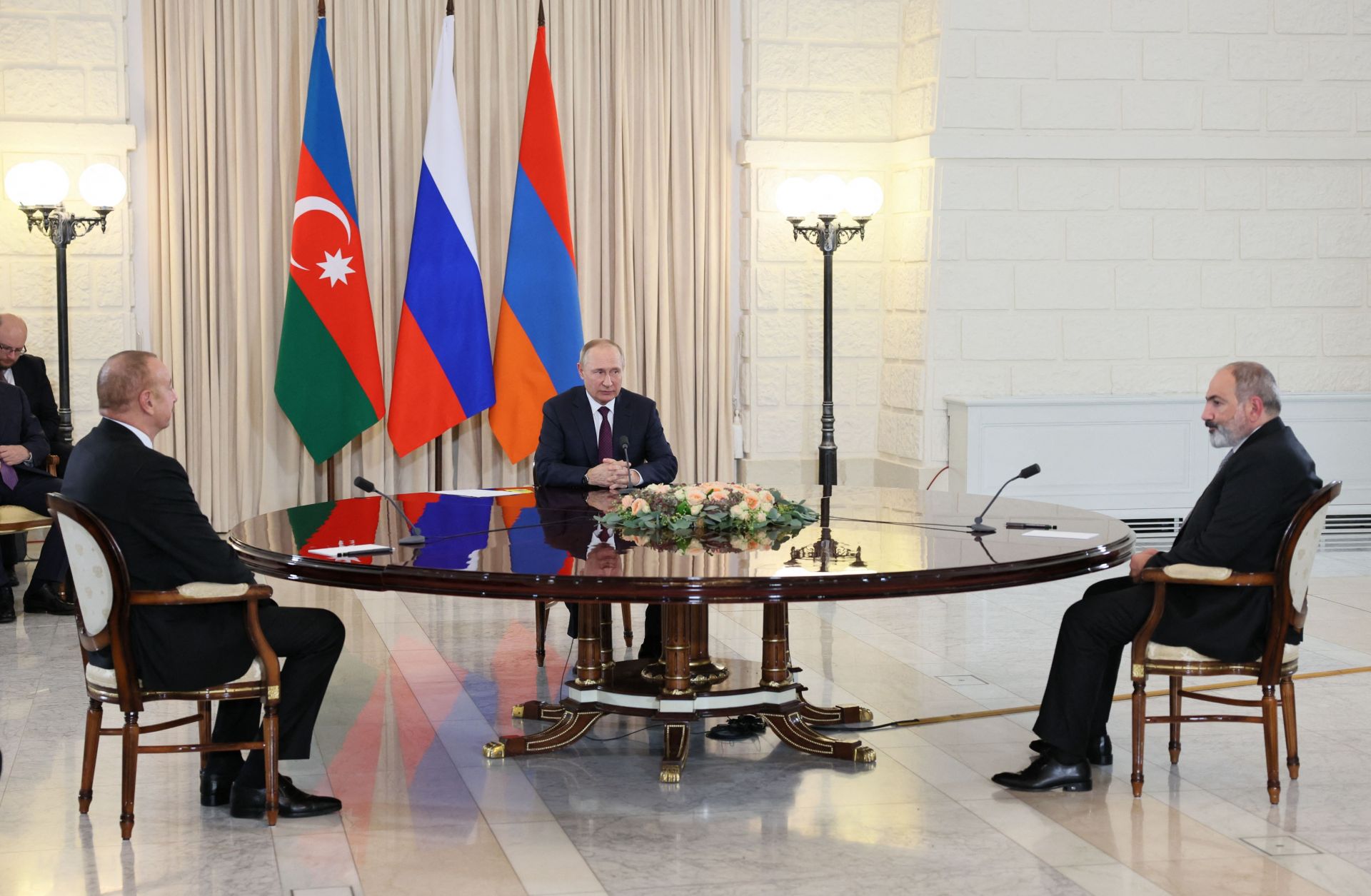 Russian President Vladimir Putin (C), Armenian Prime Minister Nikol Pashinyan (R) and Azerbaijani President Ilham Aliyev hold talks Oct. 31, 2022, in Sochi, Russia.