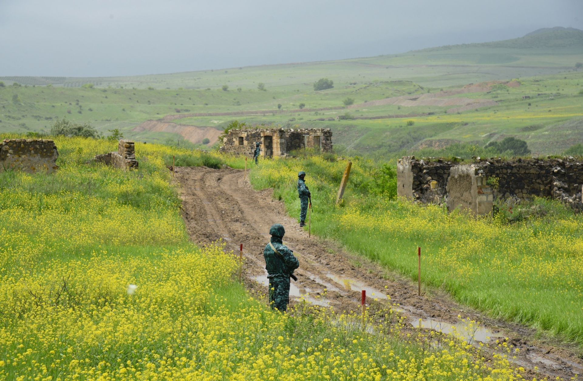 Azerbaijan's border guards are seen in Ghizilhajili, a village thar Armenia recently returned to Azerbaijani control under border demarcation deal between the Caucasus rivals.