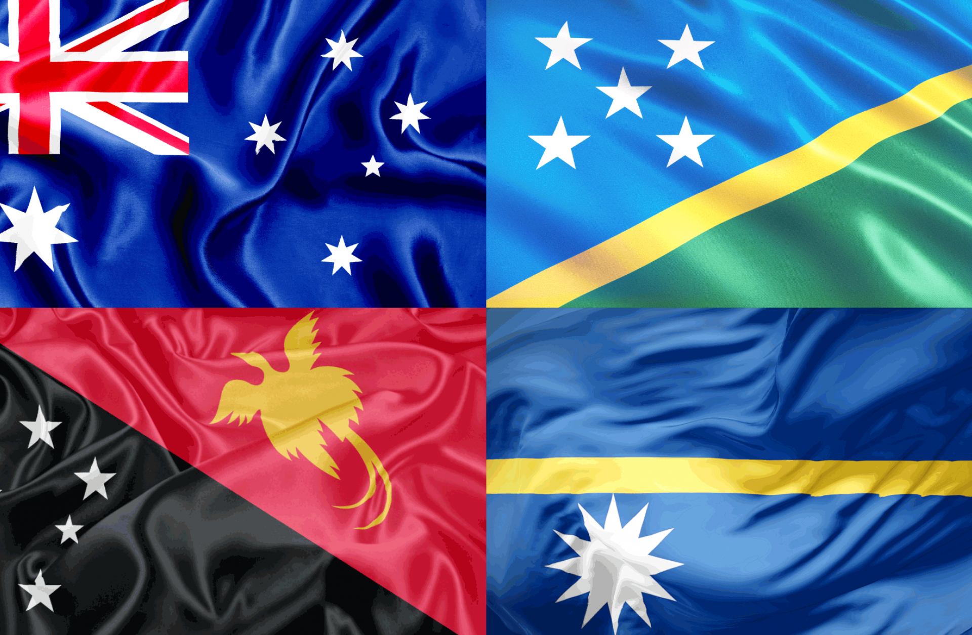 The flags of Australia, the Solomon Islands, Nauru and Papua New Guinea clockwise starting from the upper left.