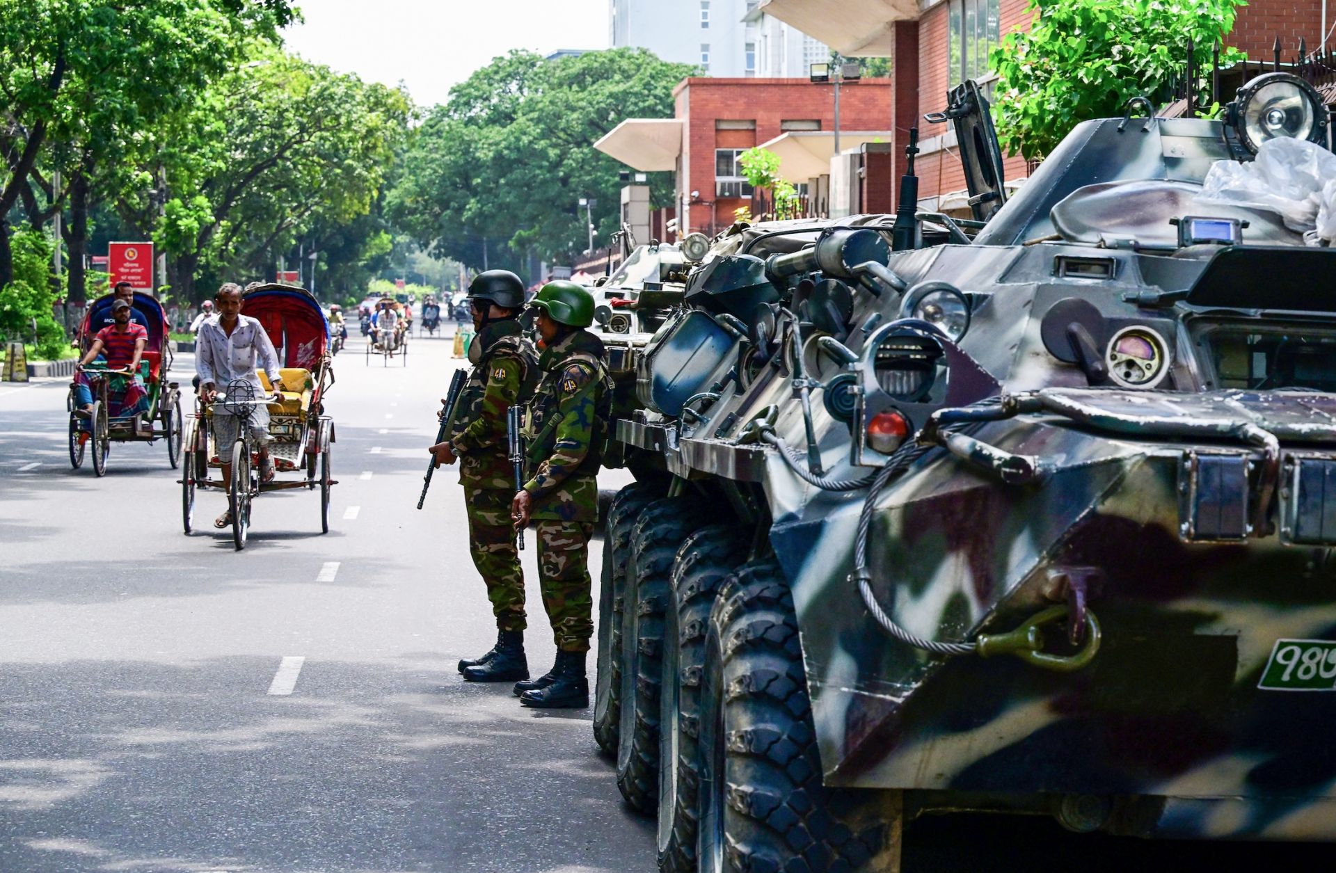 Bangladeshi soldiers stand guard in Dhaka on July 27, 2024.