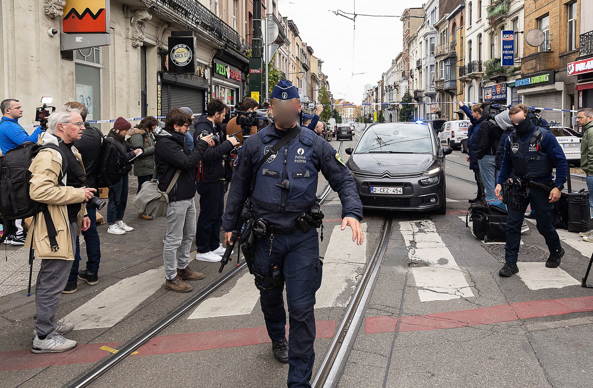 The street in the Schaerbeek area of Brussels on Oc. 17, 2023, after the suspected perpetrator of a fatal terrorist attack in the Belgian capital was shot dead.