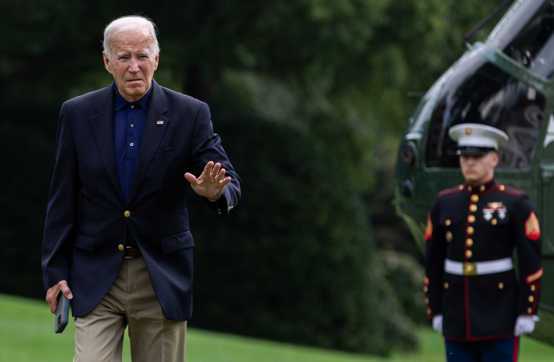 U.S. President Joe Biden gestures to reporters after landing on the South Lawn of the White House on Sept. 22, 2024, in Washington, D.C. 