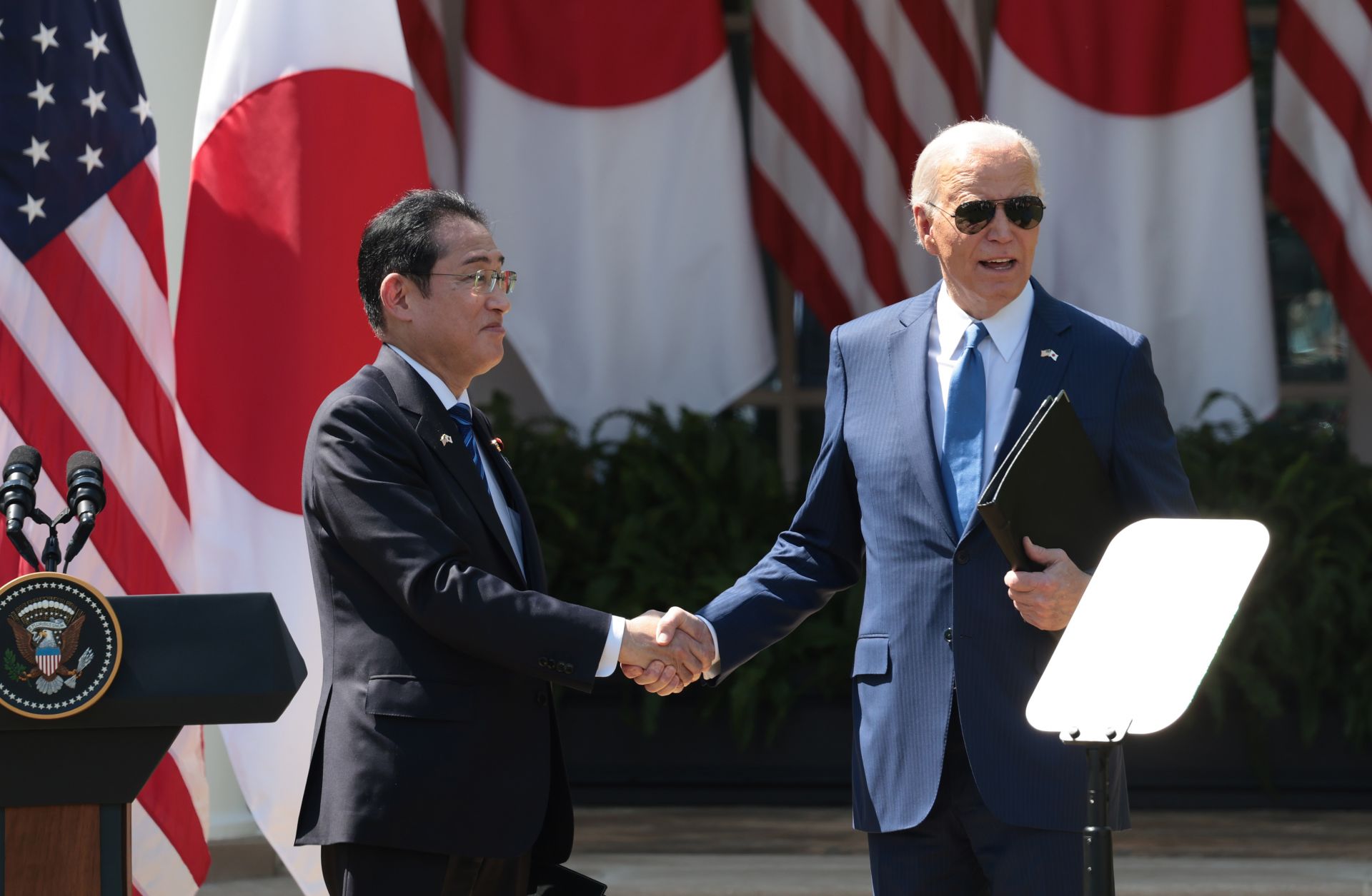 U.S. President Joe Biden (right) and Japanese Prime Minister Fumio Kishida shake hands following a joint press conference in the Rose Garden at the White House on April 10, 2024, in Washington, D.C. 