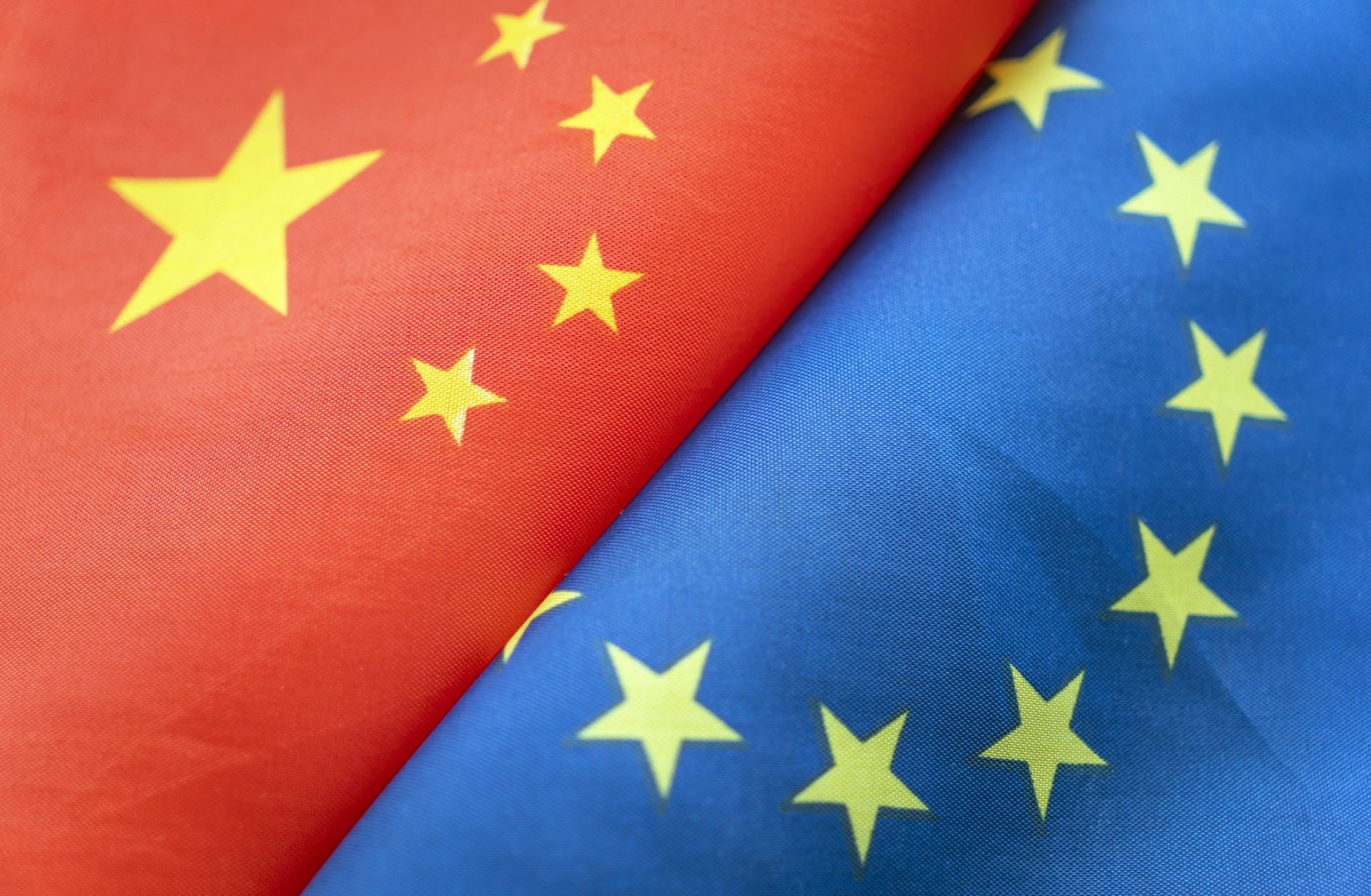 A picture of the Chinese and EU flags