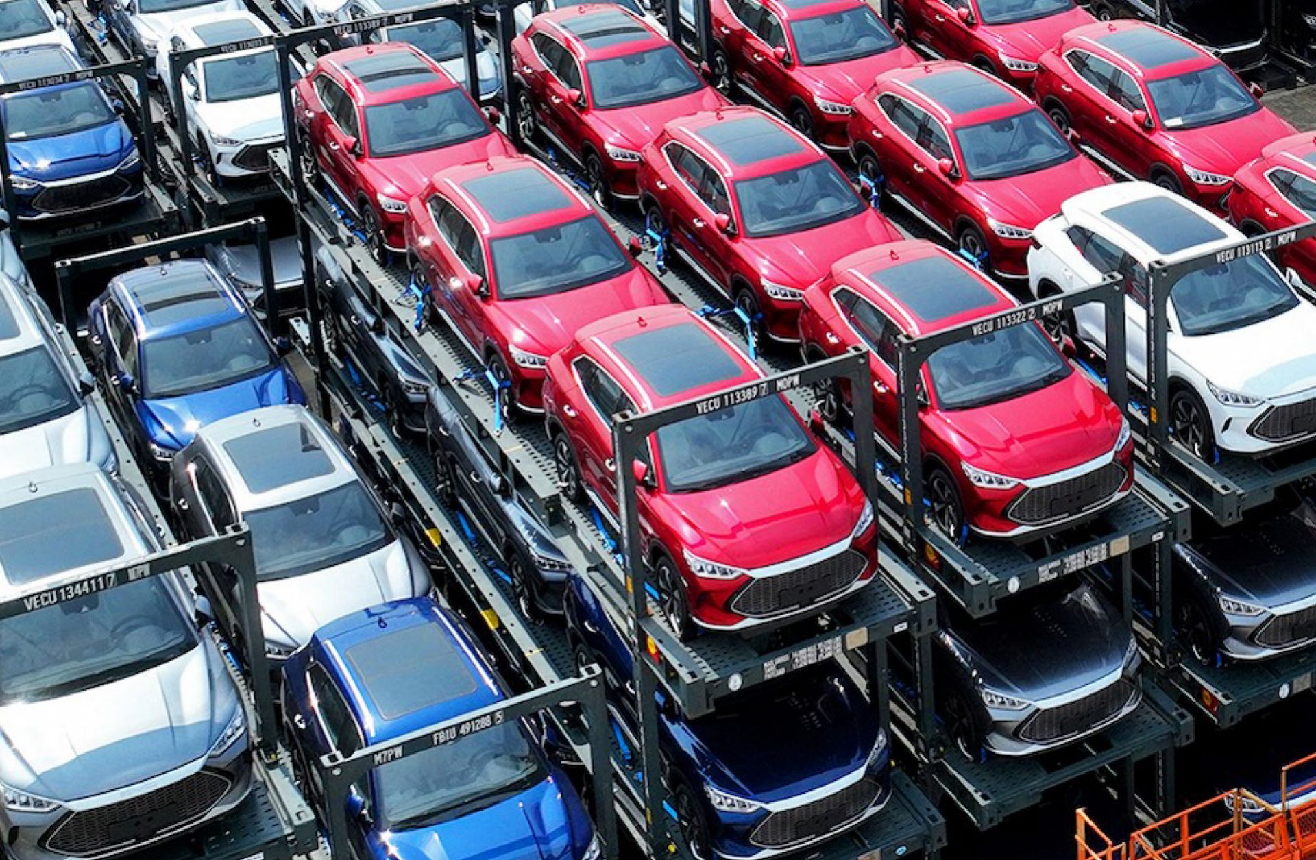 Chinese car manufacturer BYD's stacked electric vehicles wait to be loaded onto a ship at the international container terminal of Taicang Port at Suzhou Port in China's eastern Jiangsu province on Sept. 11, 2023.