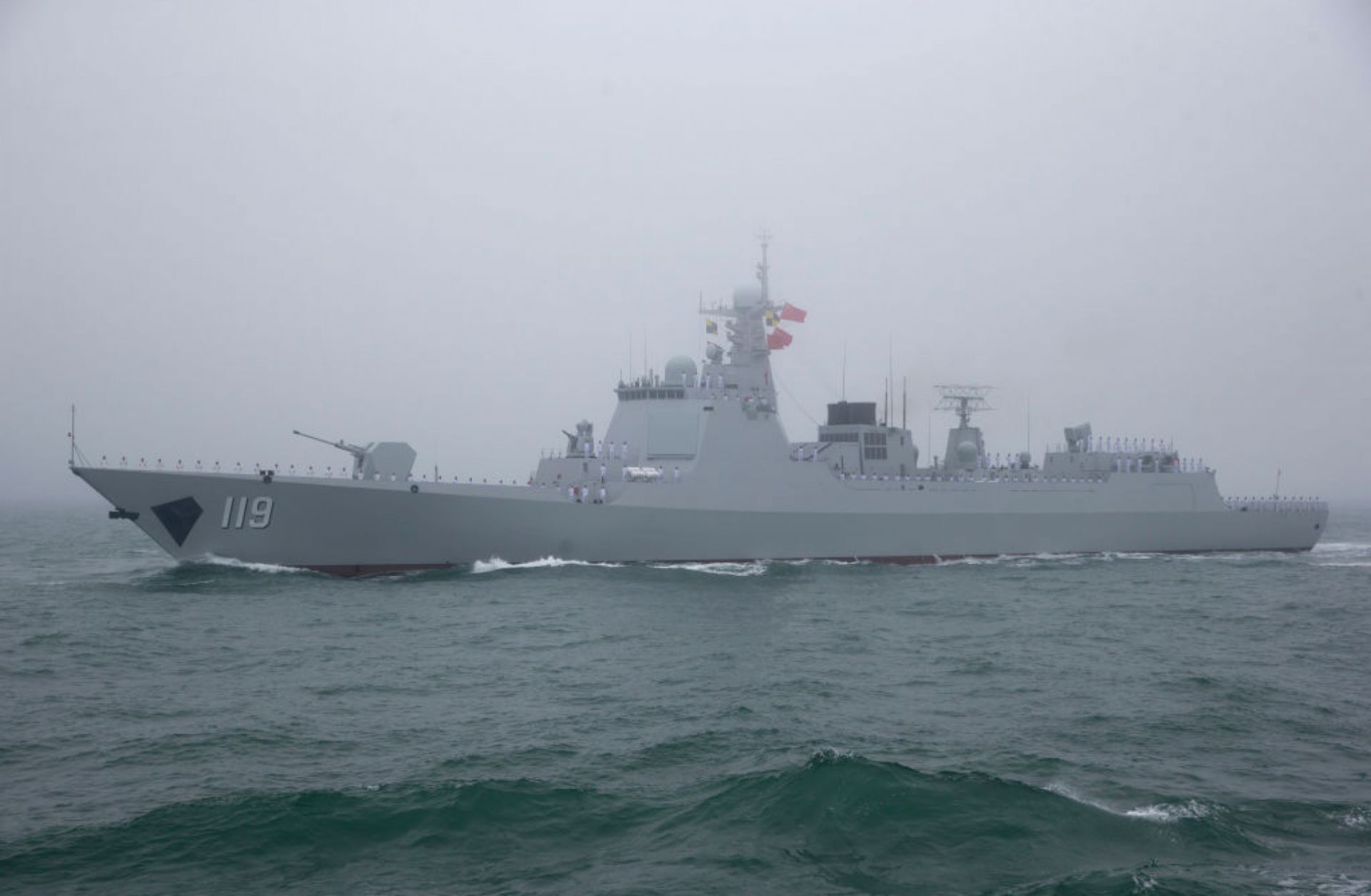 A Chinese frigate participates in a naval parade in the sea near Qingdao, in eastern China's Shandong province, on April 23, 2019. 