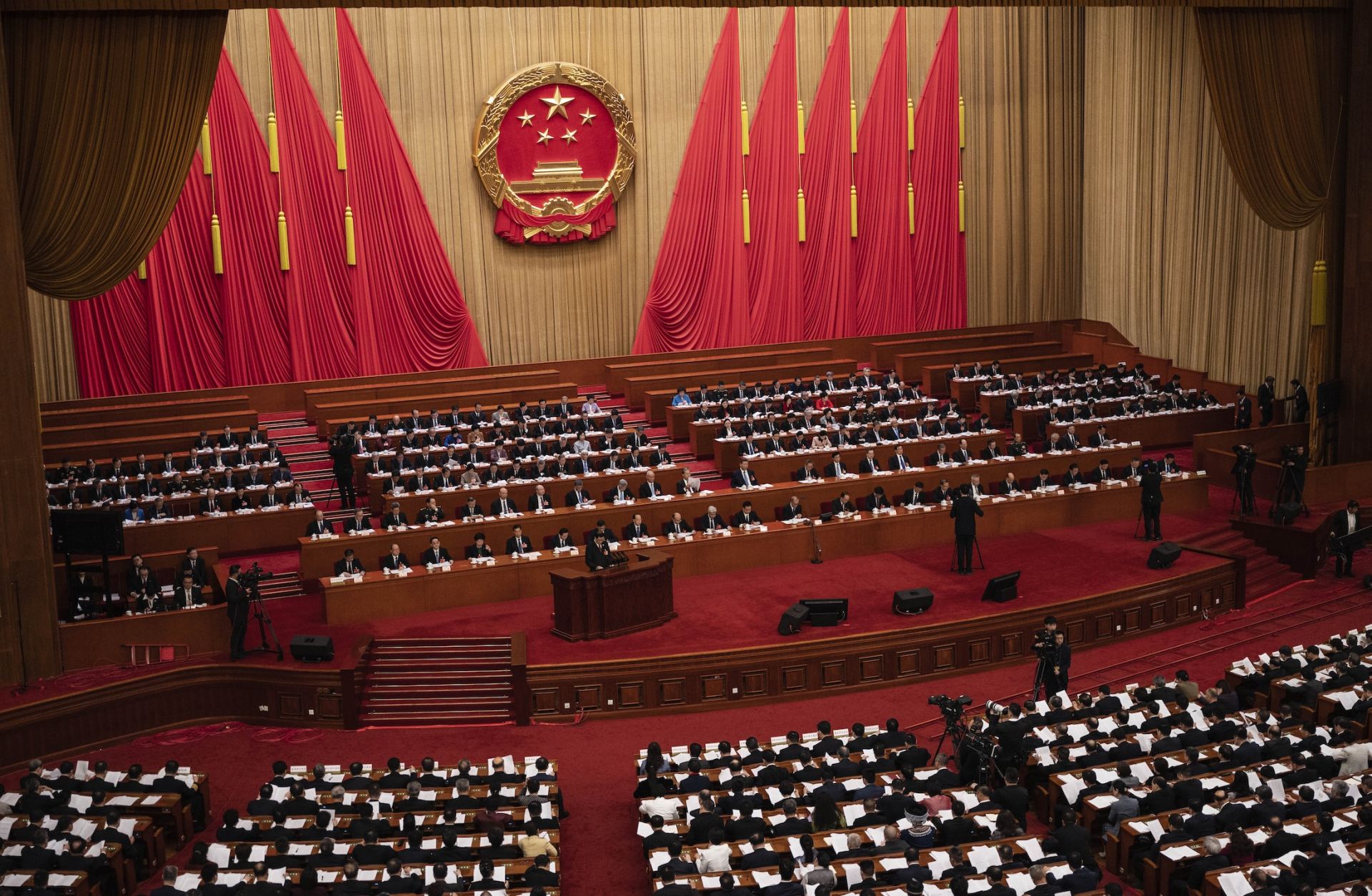 Chinese President Xi Jinping, center, and other senior government members and deputies attend the second plenary session of the National People's Congress at the Great Hall of the People on March 8, 2025, in Beijing, China.