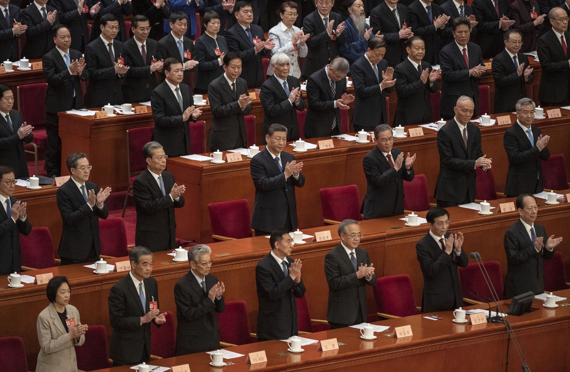 Chinese President Xi Jinping (center) and other senior leaders applaud at the closing session of the Chinese People's Political Consultative Conference, or CPPCC, on March 10, 2024, in Beijing, China. 