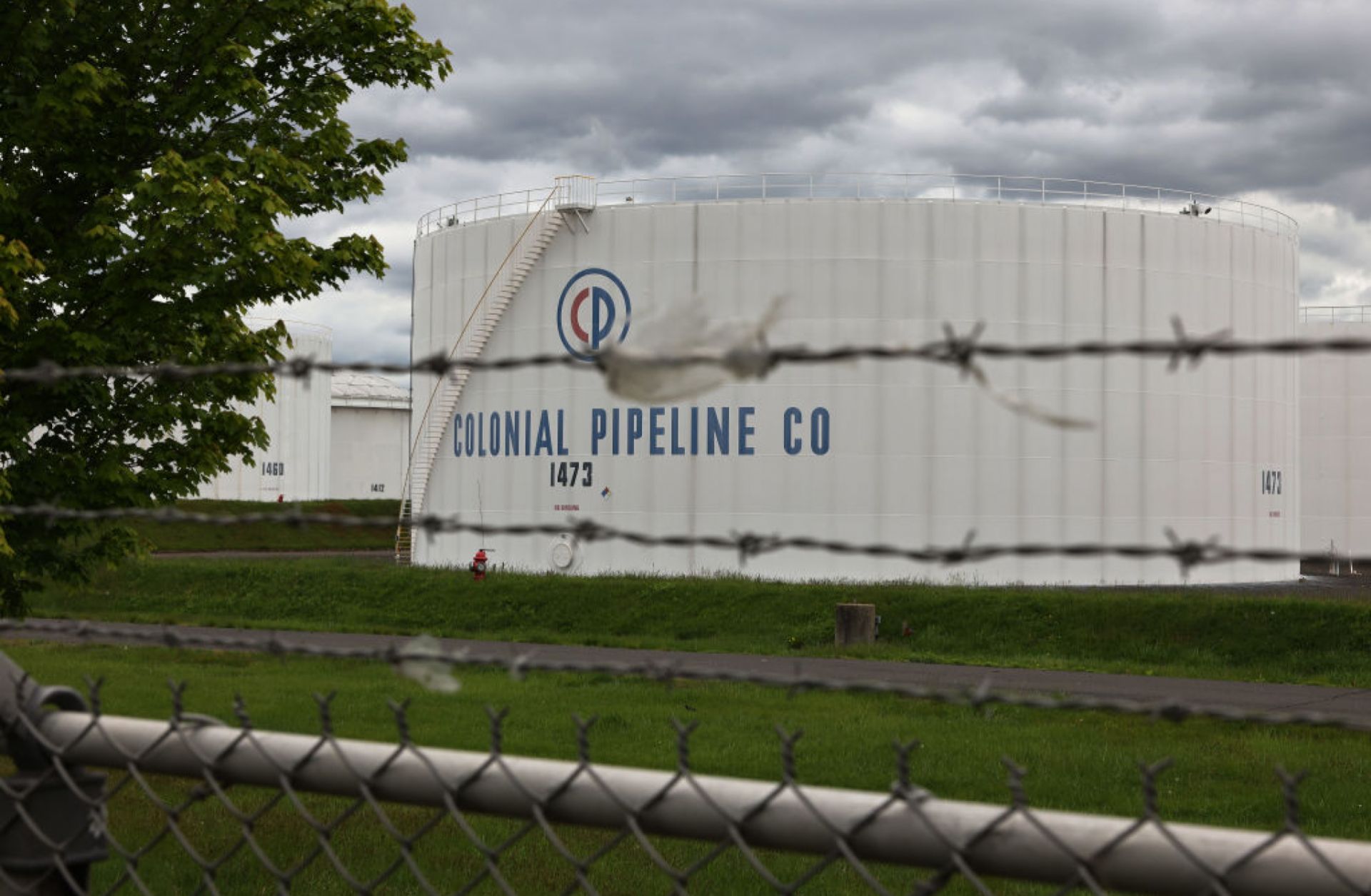 Fuel holding tanks are seen at Colonial Pipeline's Linden Junction Tank Farm in Woodbridge, New Jersey, on May 10, 2021. The cyberattack exposes the vulnerability of U.S. critical infrastructure and the rising threat of for-hire ransomware groups targeting Western businesses. Fuel holding tanks are seen at Colonial Pipeline's Linden Junction Tank Farm in Woodbridge, New Jersey, on May 10, 2021.