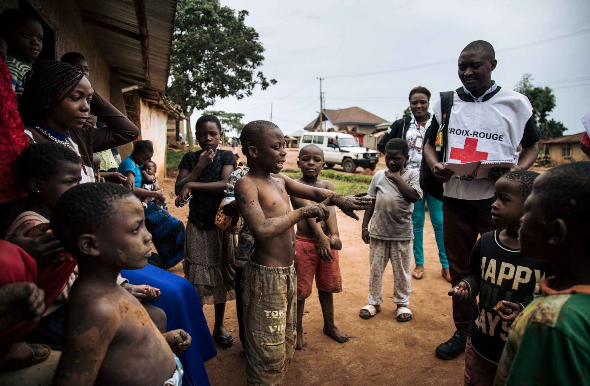 Red Cross members visit families in northeastern Democratic Republic of Congo to listen to their fear of the Ebola virus on Aug. 31, 2019.