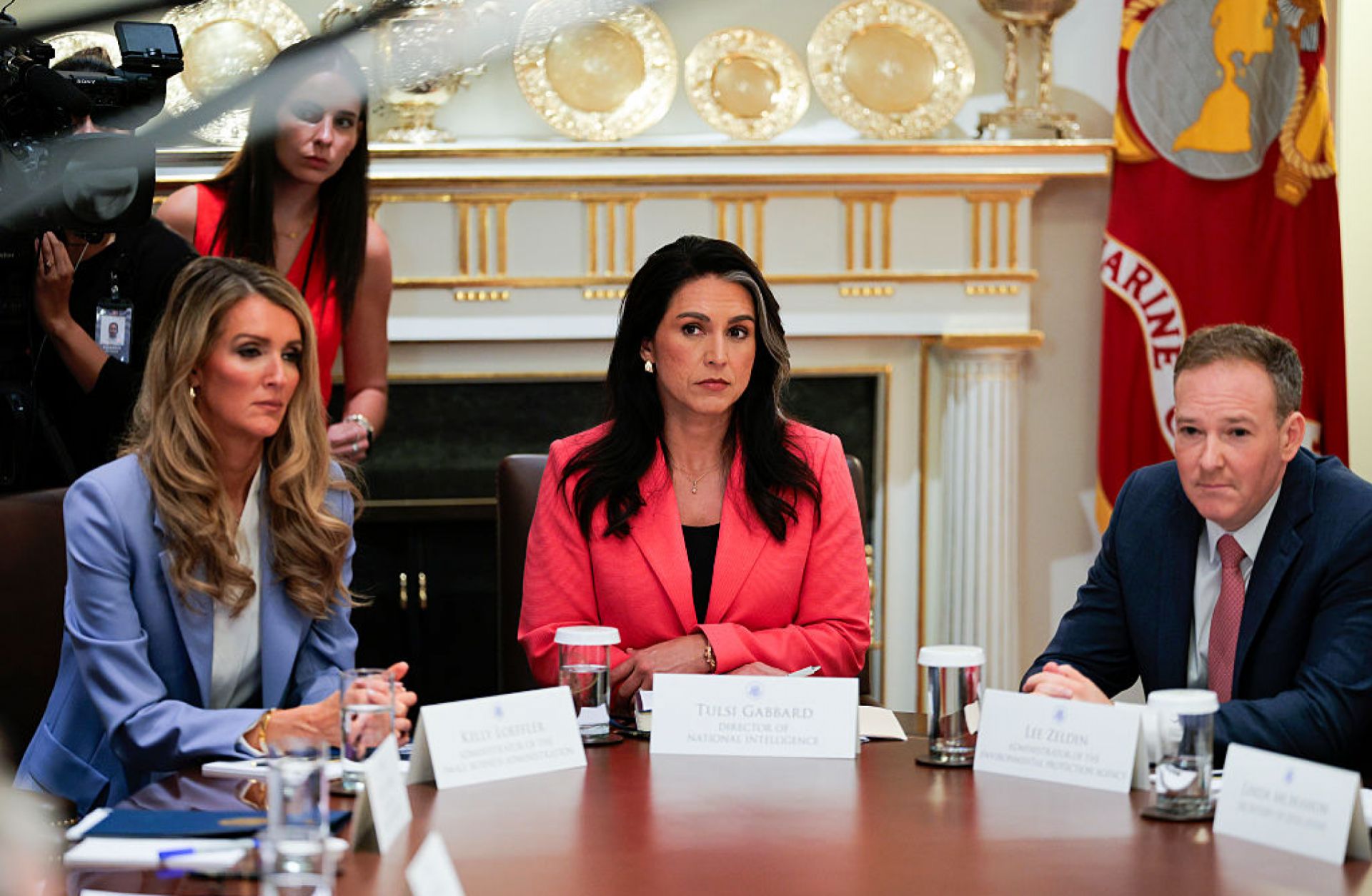 From left to right, Small Business Administration administrator Kelly Loeffler, U.S. Director of National Intelligence Tulsi Gabbard and Environmental Protection Agency administrator Lee Zeldin listen as U.S. President Donald Trump speaks during a Cabinet meeting on Aug. 26, 2025, in Washington, D.C. 