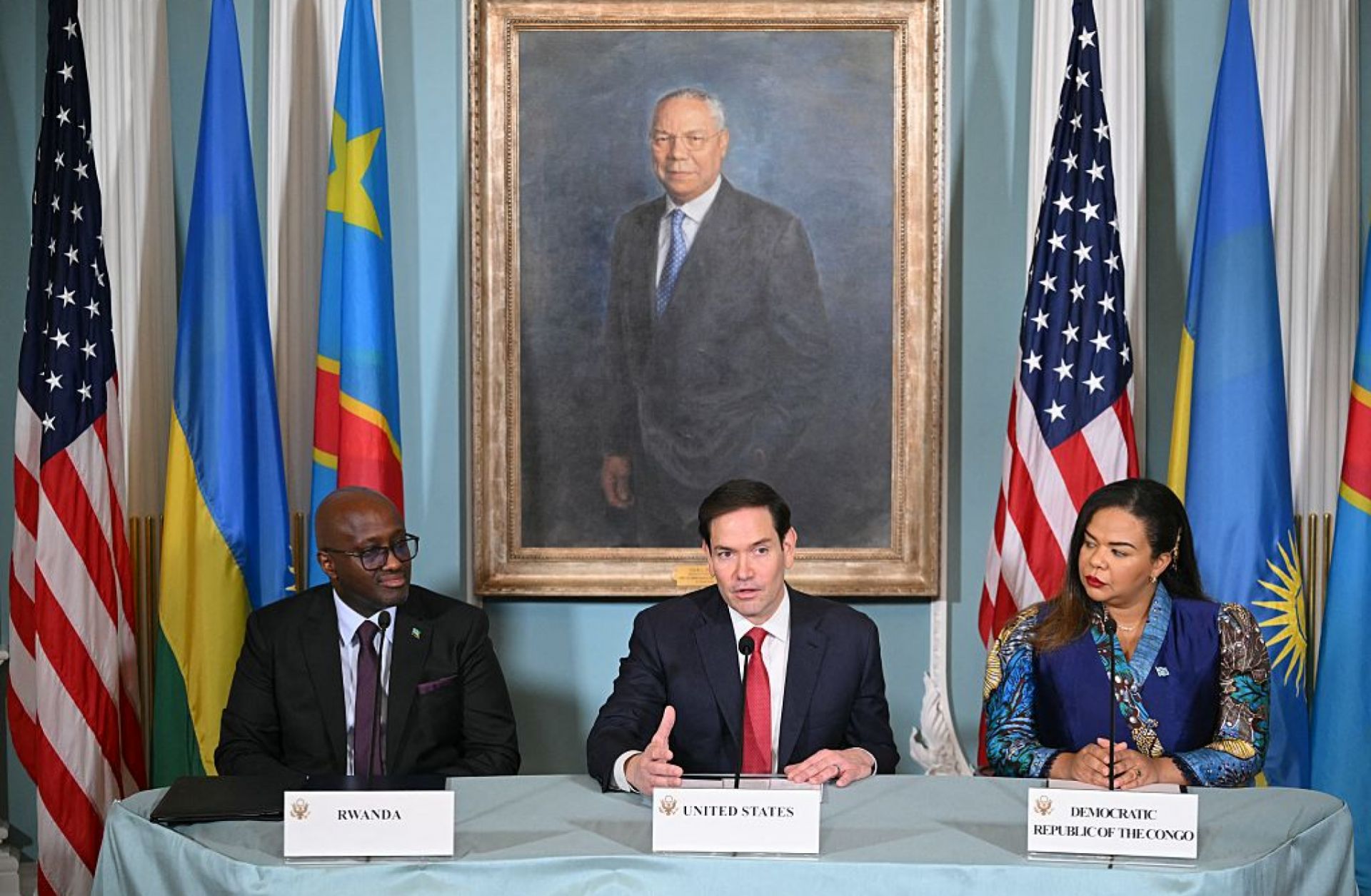 U.S. Secretary of State Marco Rubio (C) speaks during a peace agreement signing ceremony between Congolese Foreign Minister Therese Kayikwamba Wagner (R) and Rwandan Foreign Minister Olivier Nduhungirehe in the Treaty Room of the State Department in Washington, D.C., on June 27, 2025. 