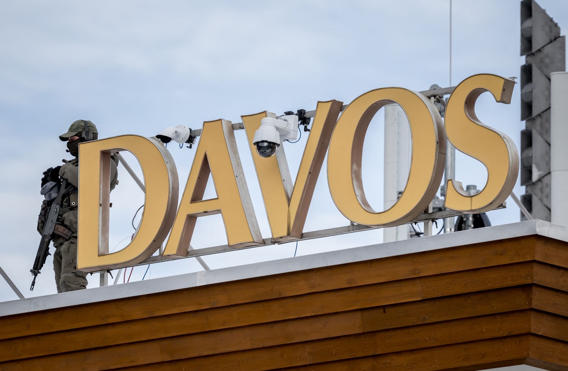 A sniper police officer on the Congress hotel during the annual meeting of the World Economic Forum on Jan. 24, 2025, in the Alpine resort of Davos, Switzerland.