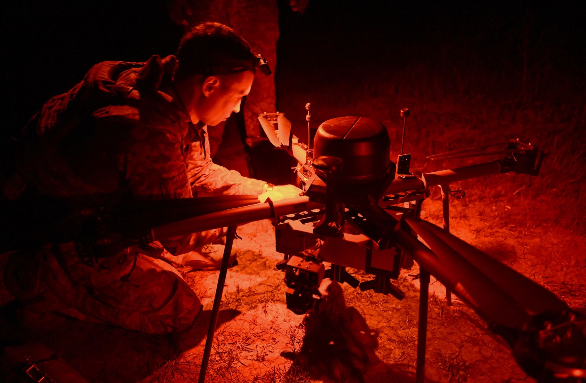 A Ukrainian serviceman from the 24th mechanized brigade prepares a Magura night drone to flight toward the front line in the area of Chasiv Yar, Donetsk region late on April 29, 2025.