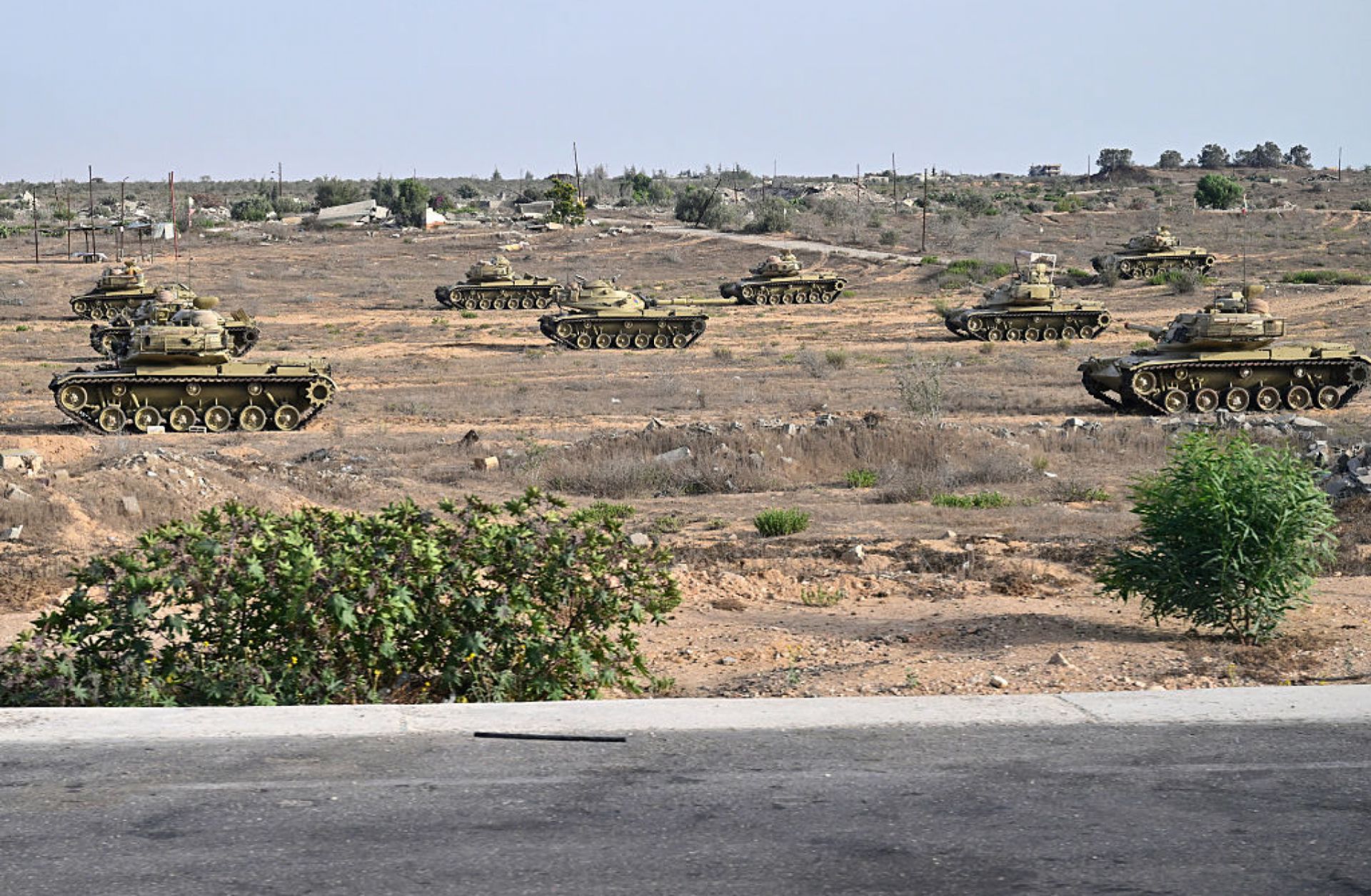 Egyptian army vehicles are deployed along the border with the Gaza Strip on July 4, 2024, in the north Sinai Peninsula. 