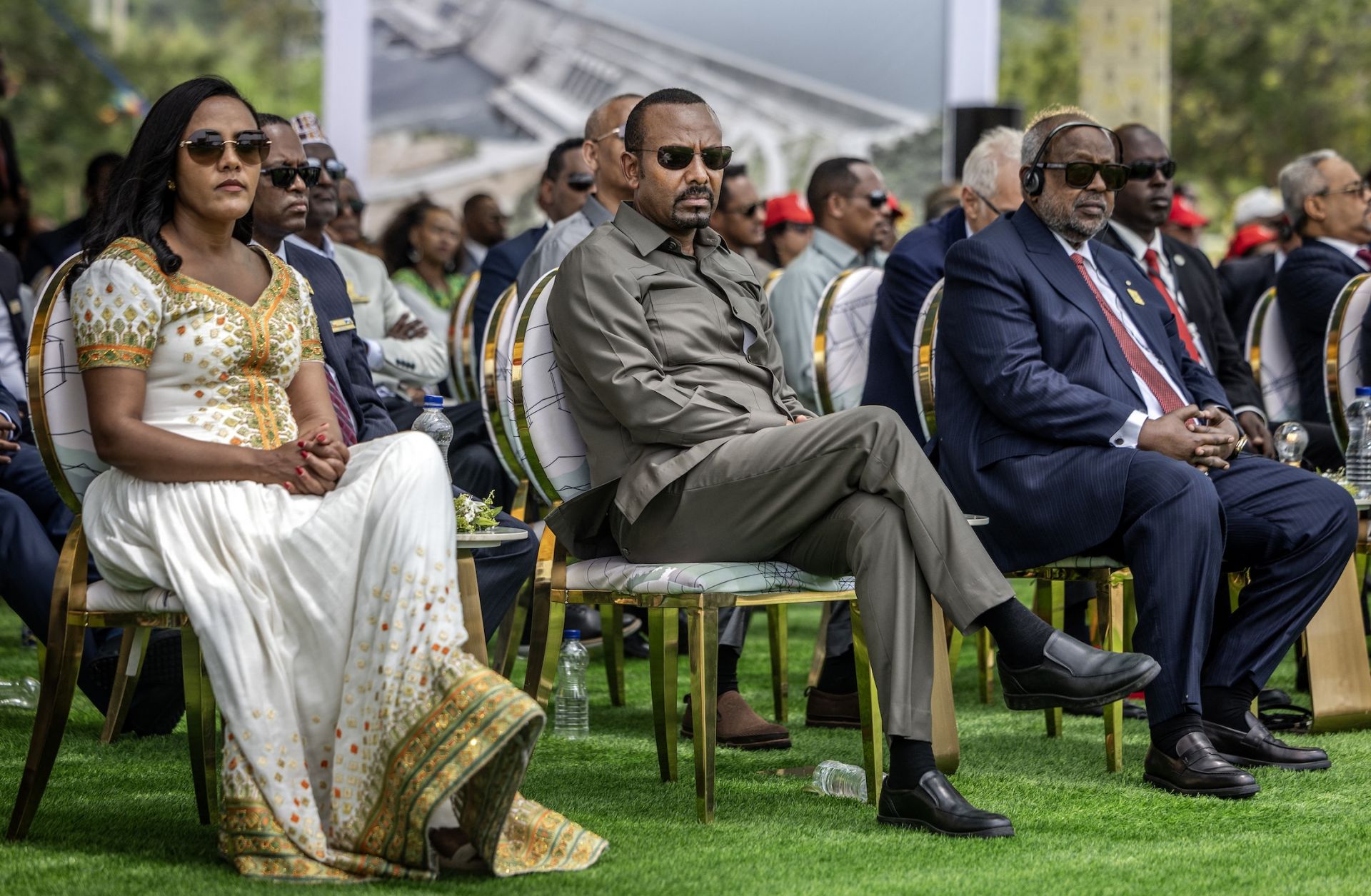 Ethiopian Prime Minister Abiy Ahmed (center), flanked by his wife (left) and Djibouti's President Ismail Omar Guelleh (right), attends the official inauguration ceremony of the Grand Ethiopian Renaissance Dam (GERD) in Guba, on Sept. 9, 2025. Ethiopian Prime Minister Abiy Ahmed (center), flanked by his wife (left) and Djibouti's President Ismail Omar Guelleh (right), attends the official inauguration ceremony of the Grand Ethiopian Renaissance Dam (GERD) in Guba, on Sept. 9, 2025.
