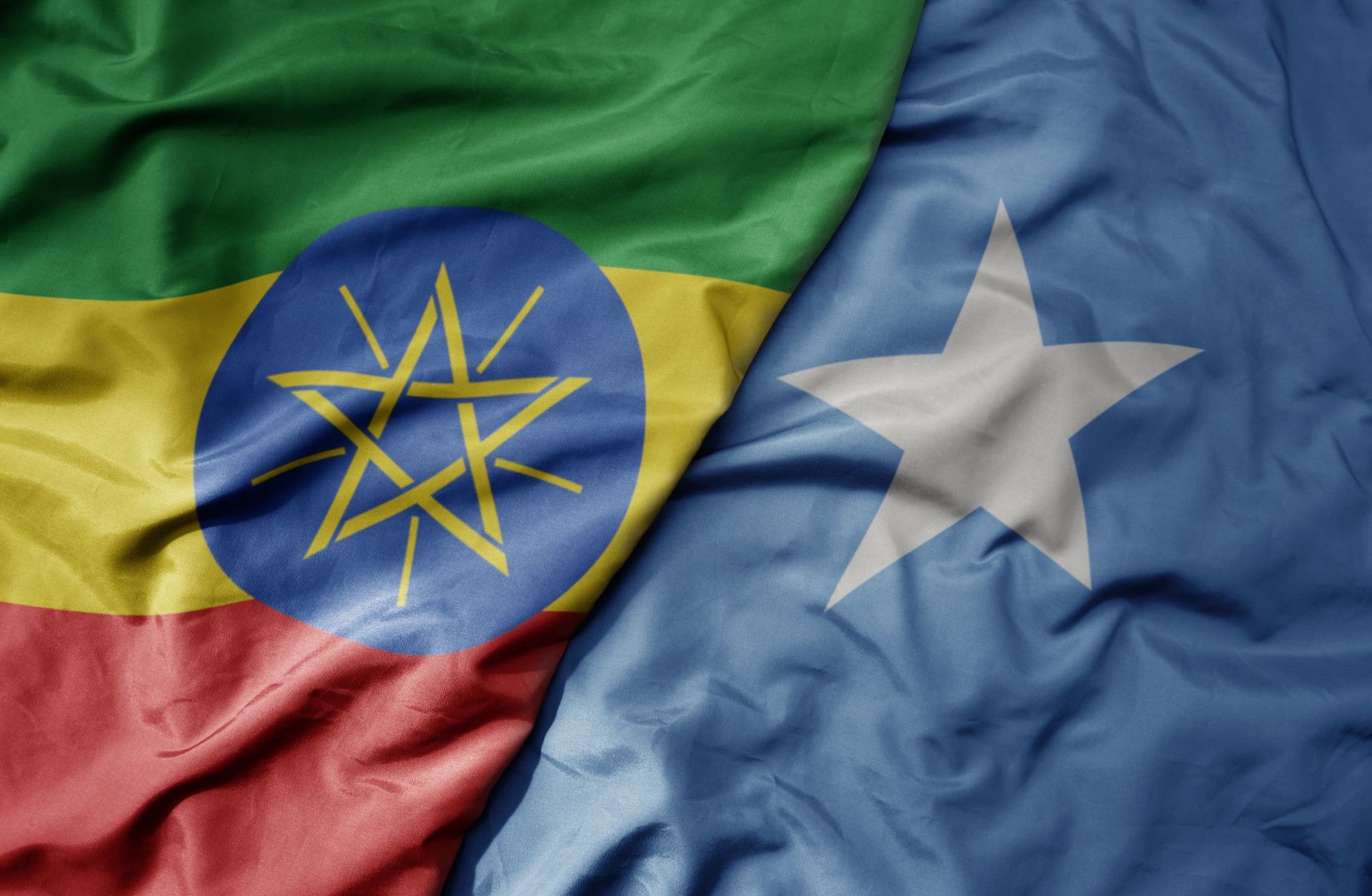 An illustration of the Ethiopian and Somali flags. An illustration of the Ethiopian and Somali flags.