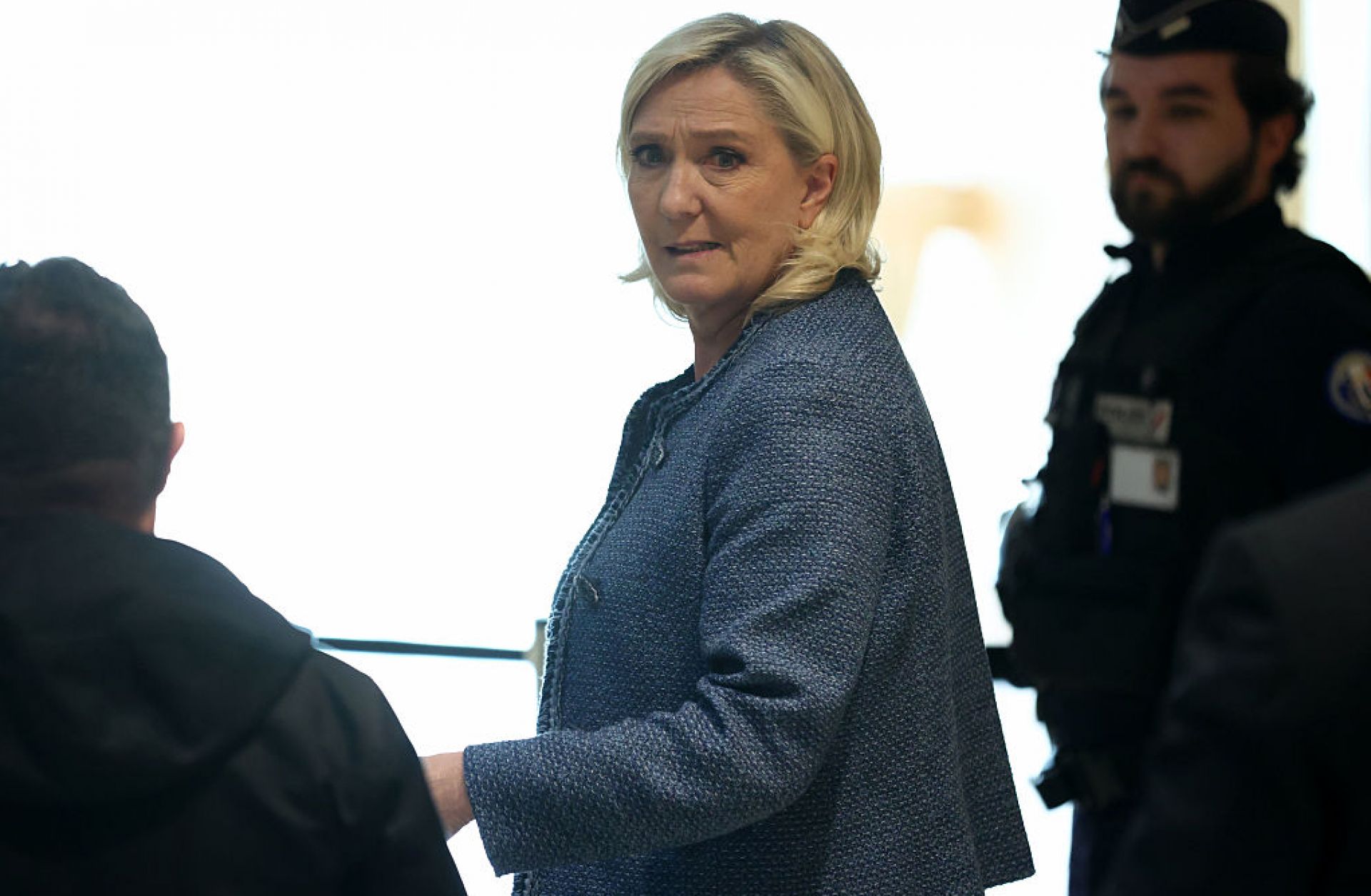 French far-right Leader Marine Le Pen leaves the courtroom after a guilty verdict in her embezzlement case trial on March 31, 2025 in Paris, France. 