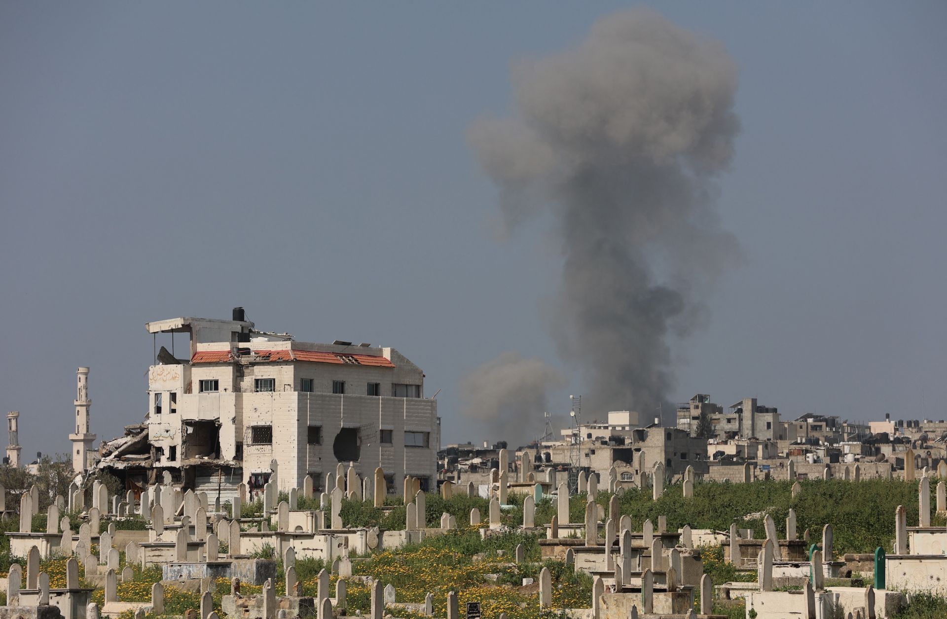 Smoke billows during Israeli strikes west of Gaza City on March 18, 2025. 