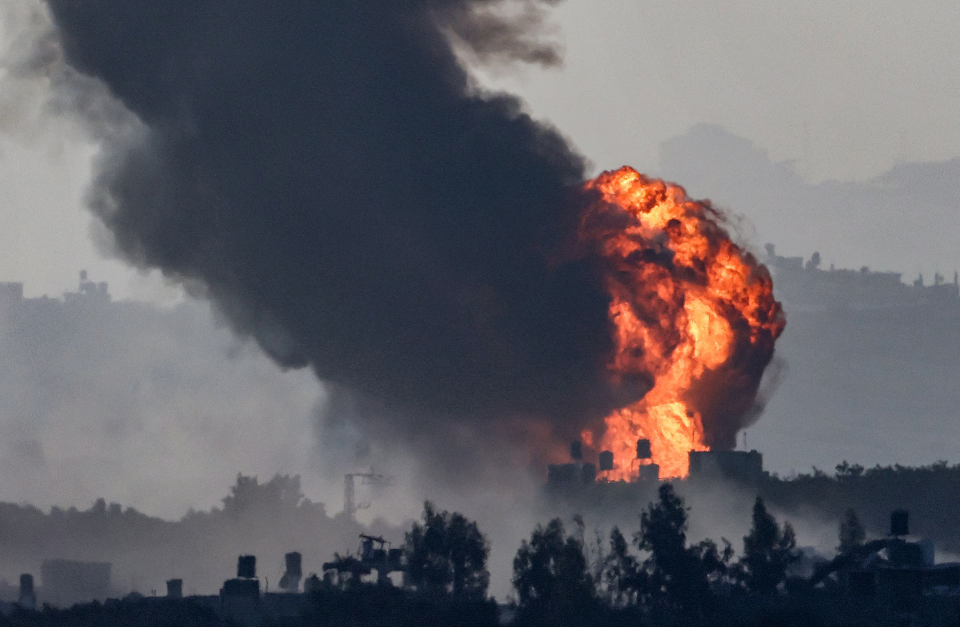 A fireball erupts over the Gaza Strip during Israeli bombardment on Nov. 8, 2023. 