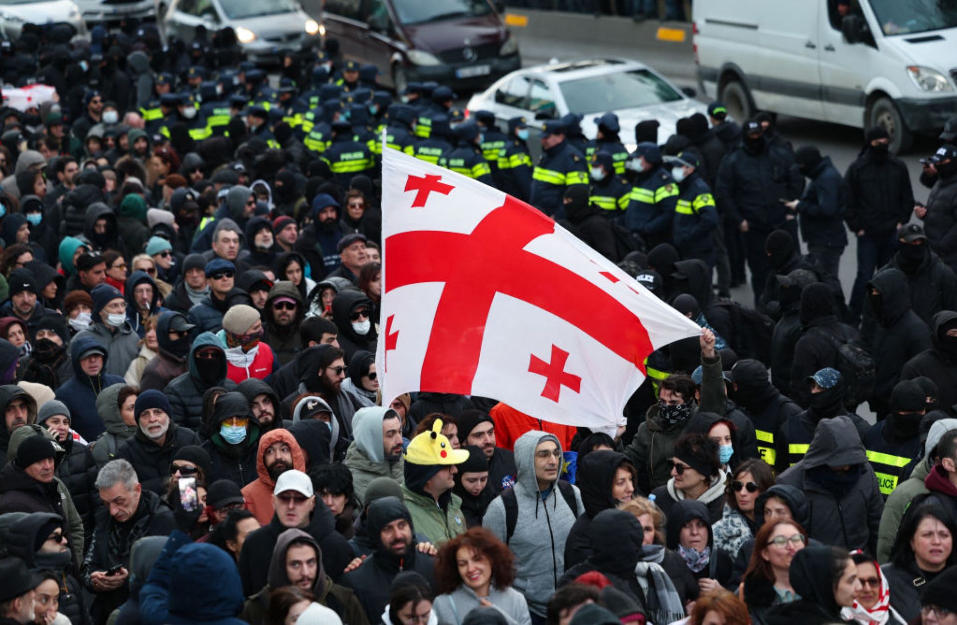 Georgian anti-government demonstrators attempt to block a highway entrance to the capital Tbilisi on Feb. 2, 2025