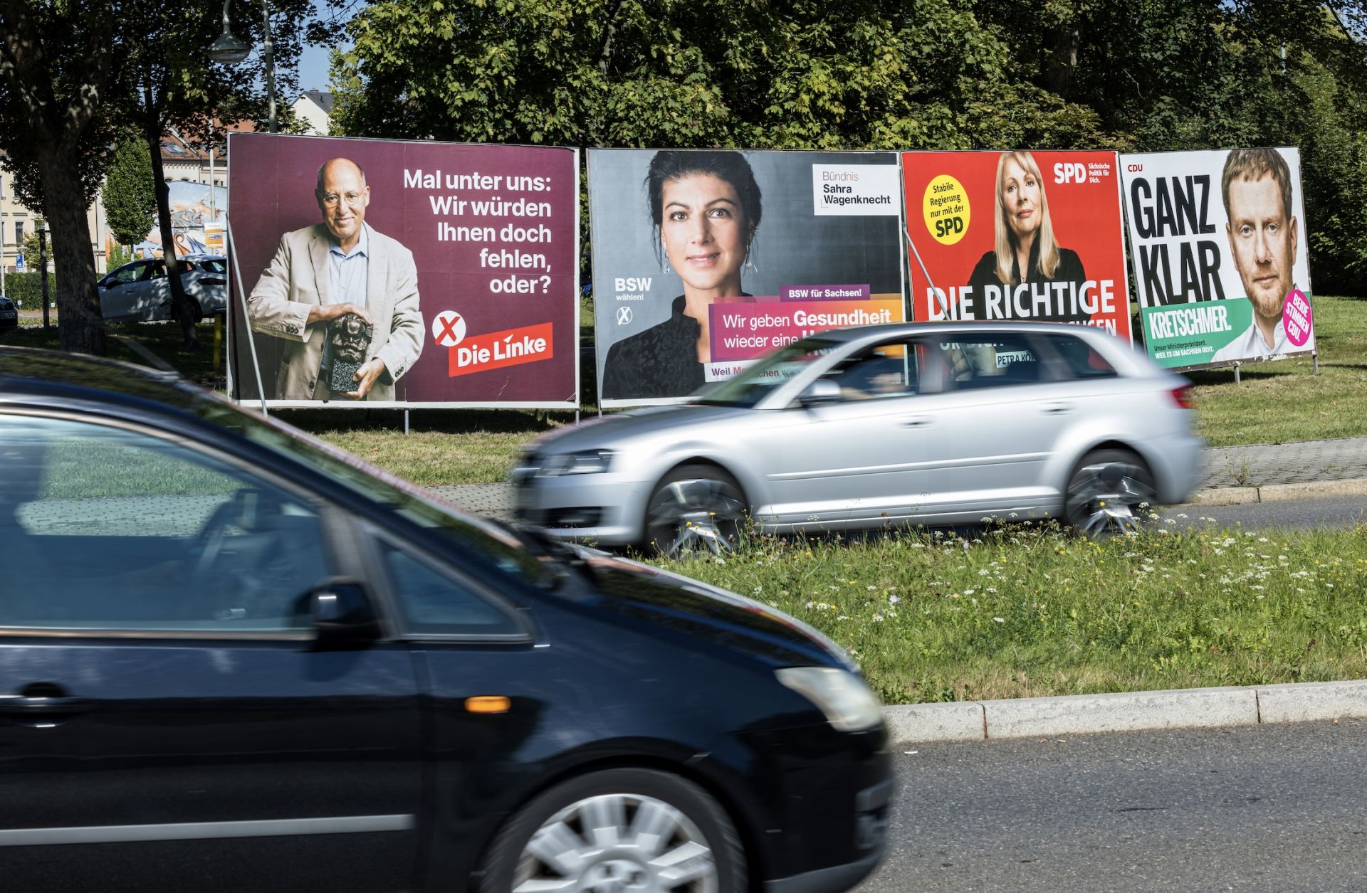 Cars drive past election campaign posters in the German city of Zwickau, located in the eastern state of Saxony, on Aug. 20, 2024, ahead of Saxony's Sept. 1 state election. 