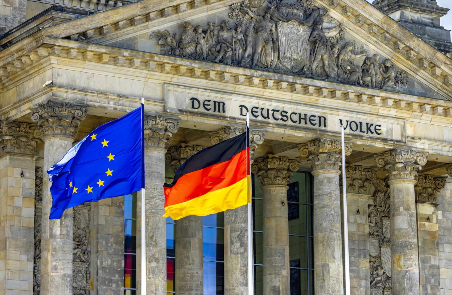 Reichstag in Berlin with flags.