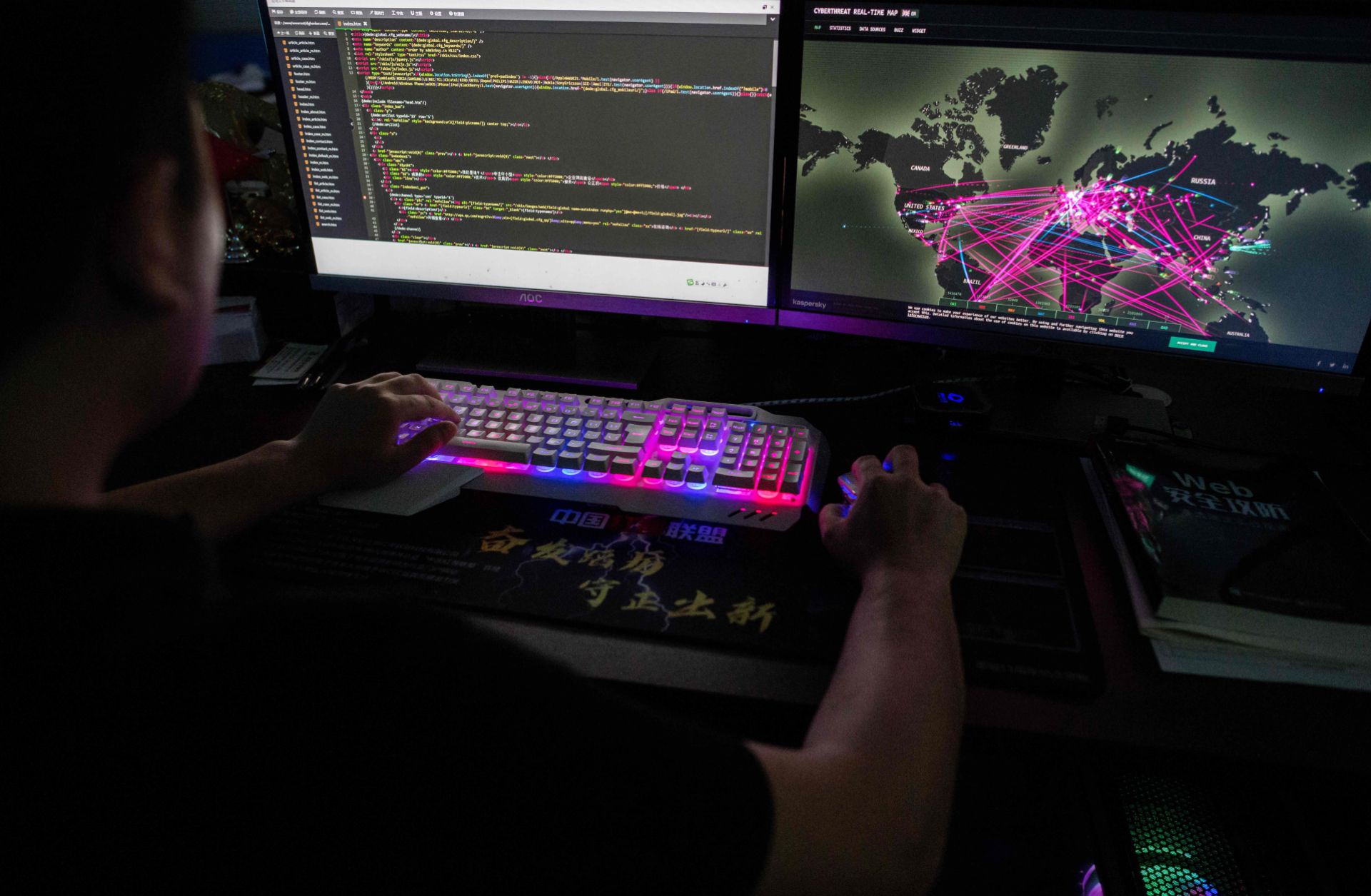 A member of the hacking group Red Hacker uses a website that monitors global cyberattacks in Dongguan, China, on Aug. 4, 2020.