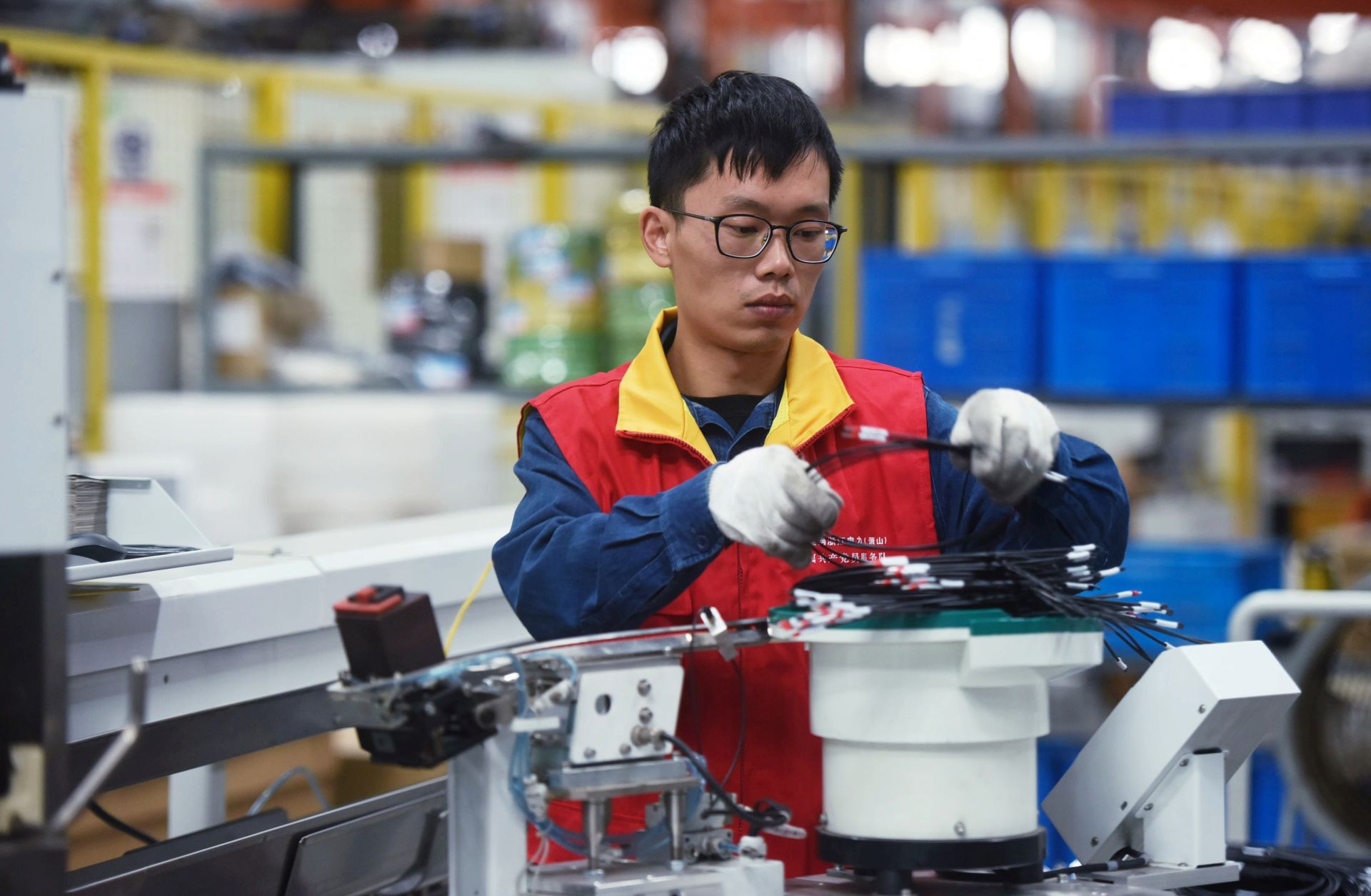 A worker assembles a power distribution cabinet in Hangzhou, China, on Oct. 19, 2020. A worker assembles a power distribution cabinet in Hangzhou, China, on Oct. 19, 2020.