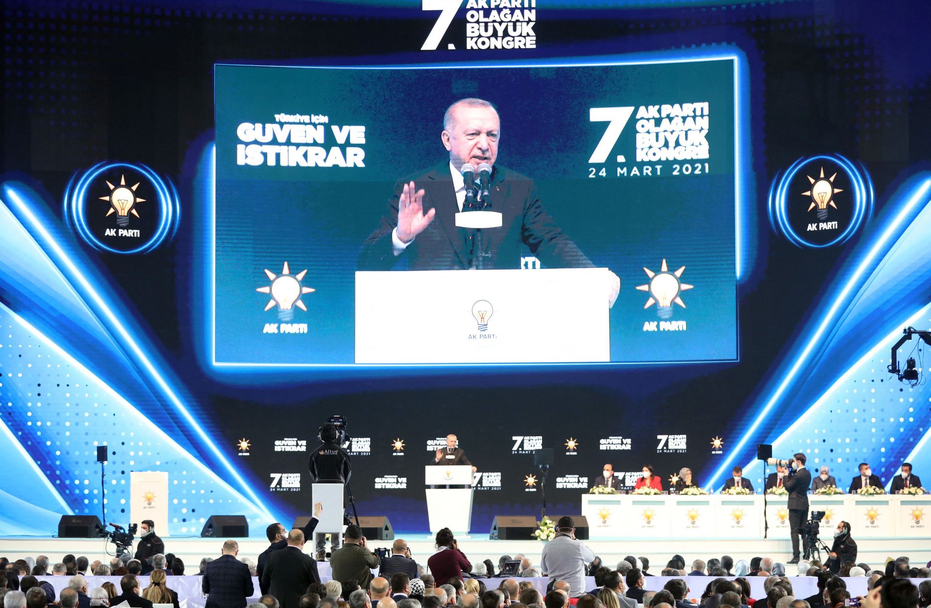 Turkish President Recep Tayyip Erdogan addresses supporters of his ruling Justice and Development Party during a political rally in Ankara on March 24, 2021. 