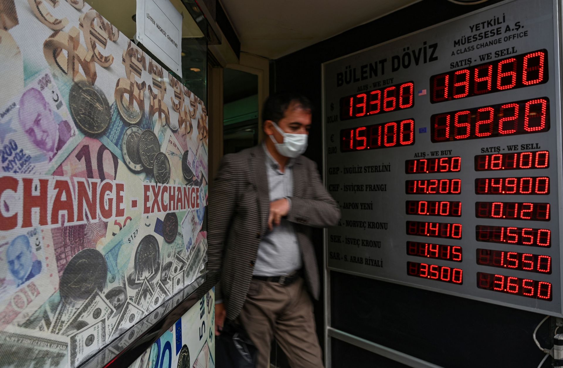A customer leaves a currency exchange agency in Istanbul, Turkey, on Dec. 2, 2021.