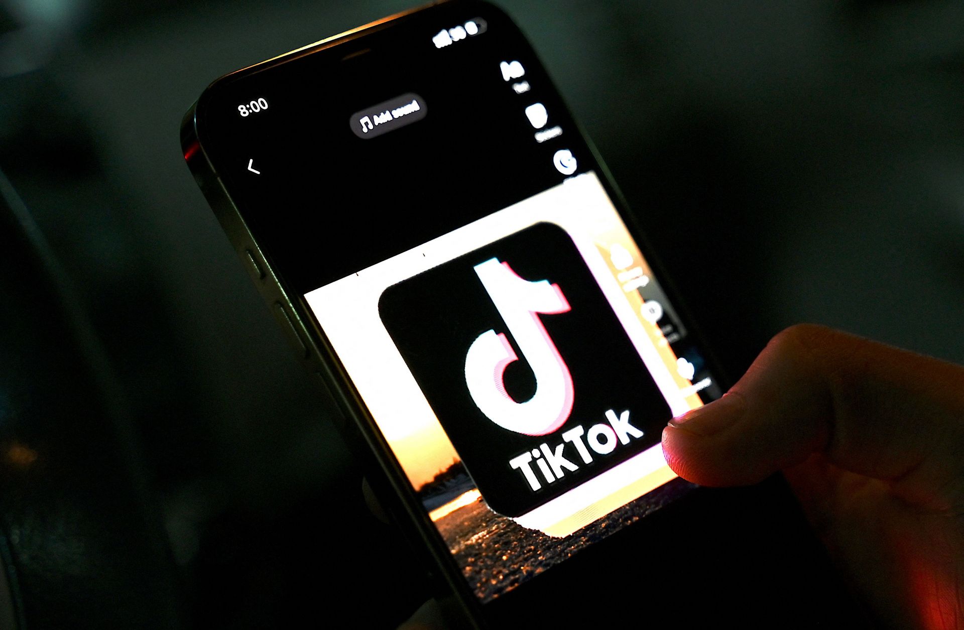 In this photo illustration taken on April 21, 2022, the icon of the video-sharing app TikTok is pictured on a mobile phone. 