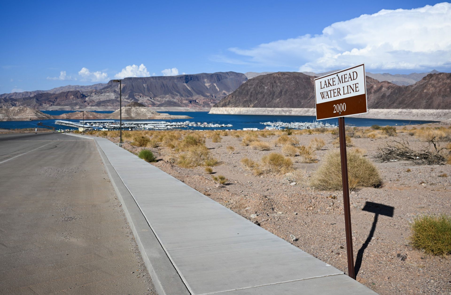 A photo taken on June 28, 2022, at Lake Mead along the Colorado River in Boulder City, Nevada, shows the lake's water line in 2000 in contrast to its current low water levels. 