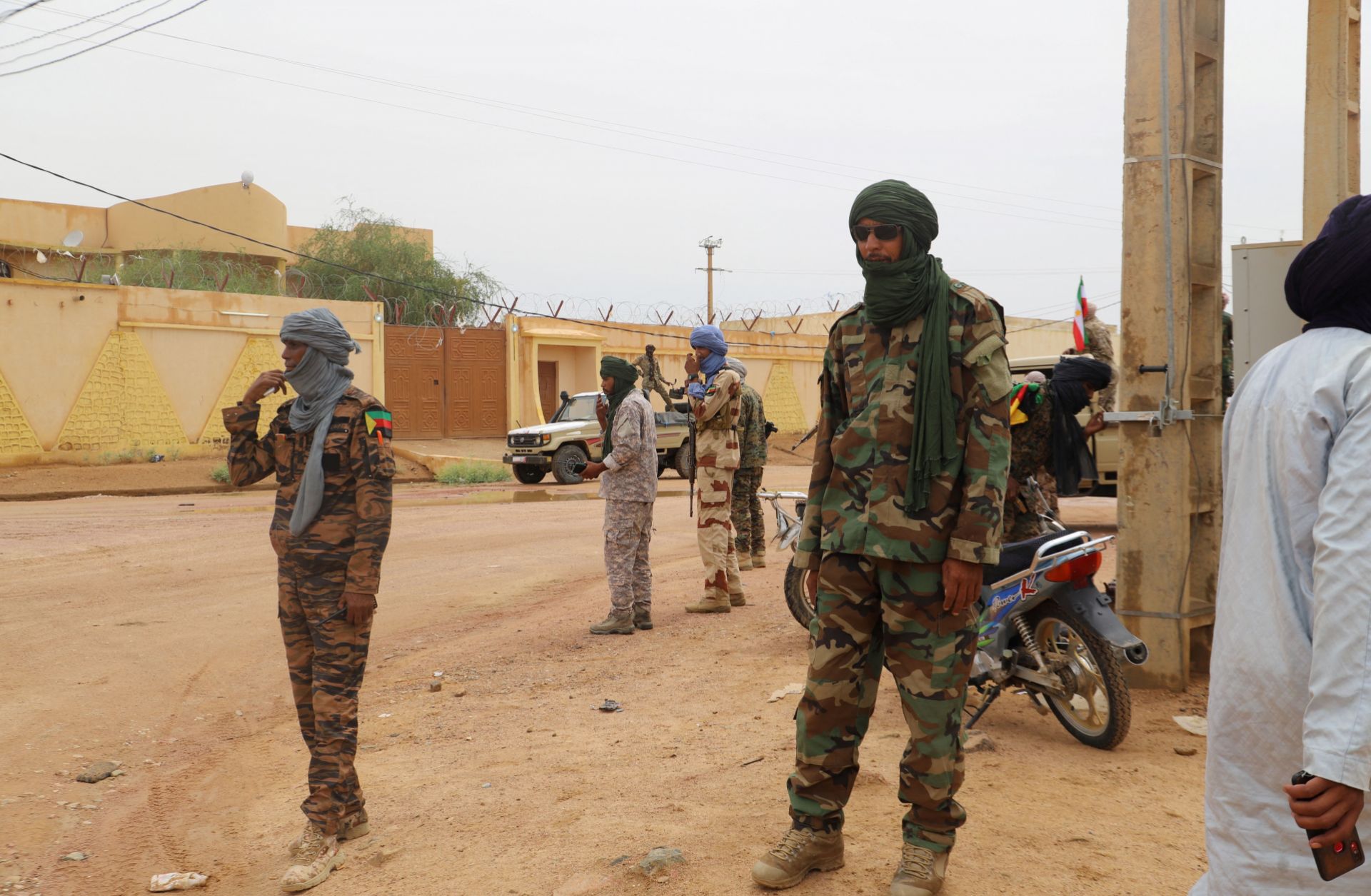 Fighters aligned with the National Movement for the Liberation of Azawad (MNLA) patrol a street in Kidal, northern Mali, on Aug. 28, 2022. 