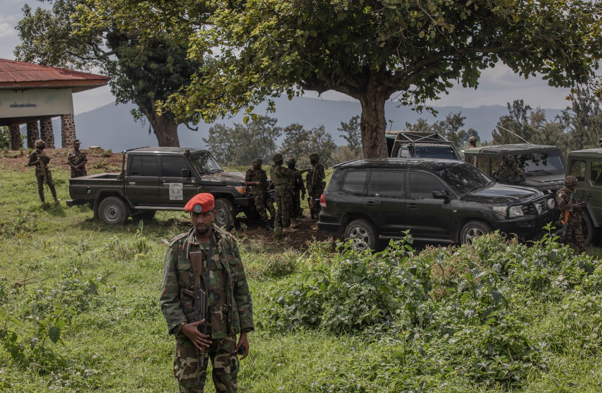 M23 fighters guard the area during a meeting between the rebel group and East African Regional Force (EACRF) officials at the Rumangabo camp in eastern Democratic Republic of Congo on Jan. 6, 2023.