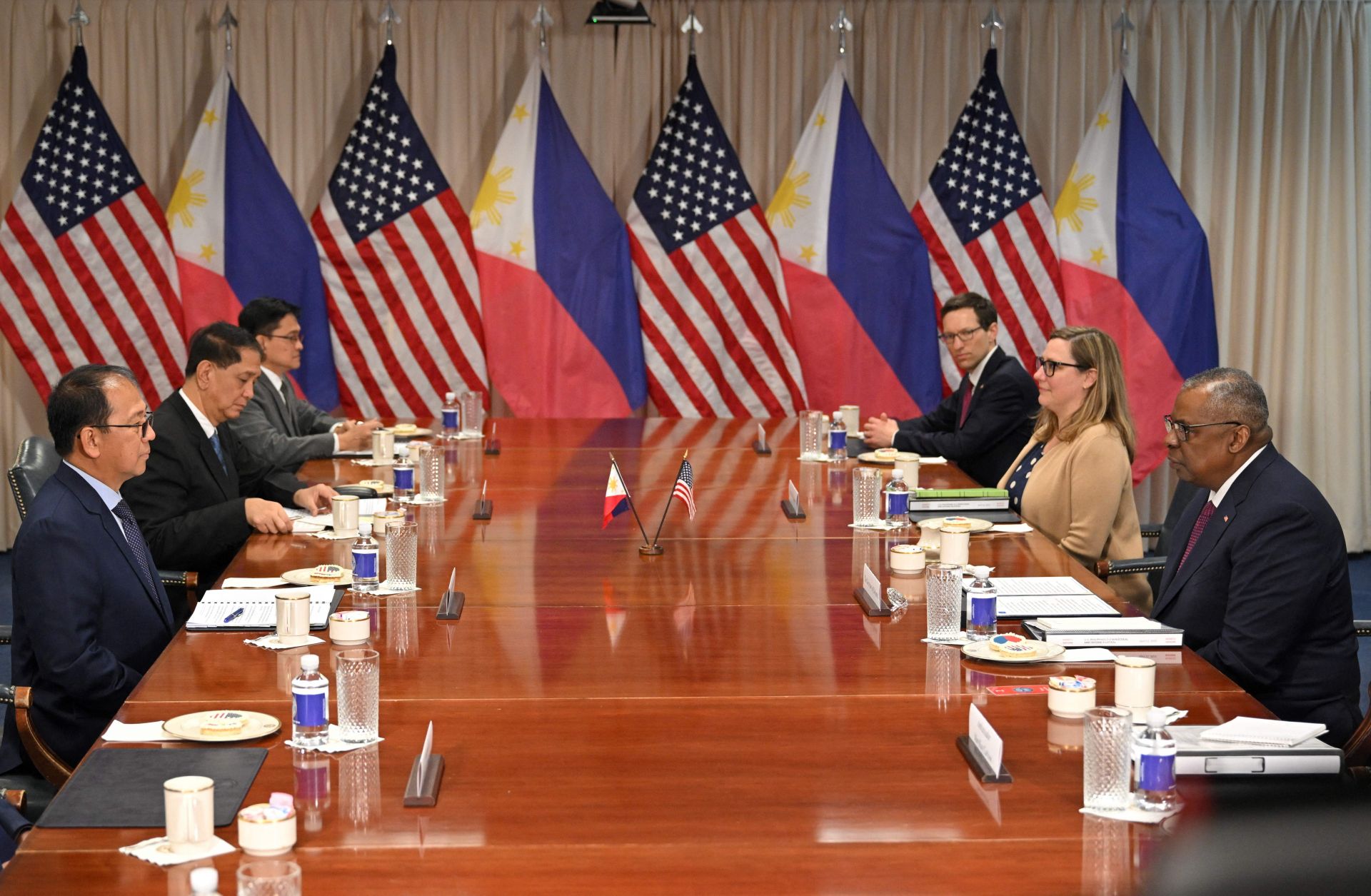 U.S. Defense Secretary Lloyd Austin (right) meets with his Philippine counterpart, Carlito Galvez (left), at the Pentagon in Washington, D.C., on April 12, 2023.