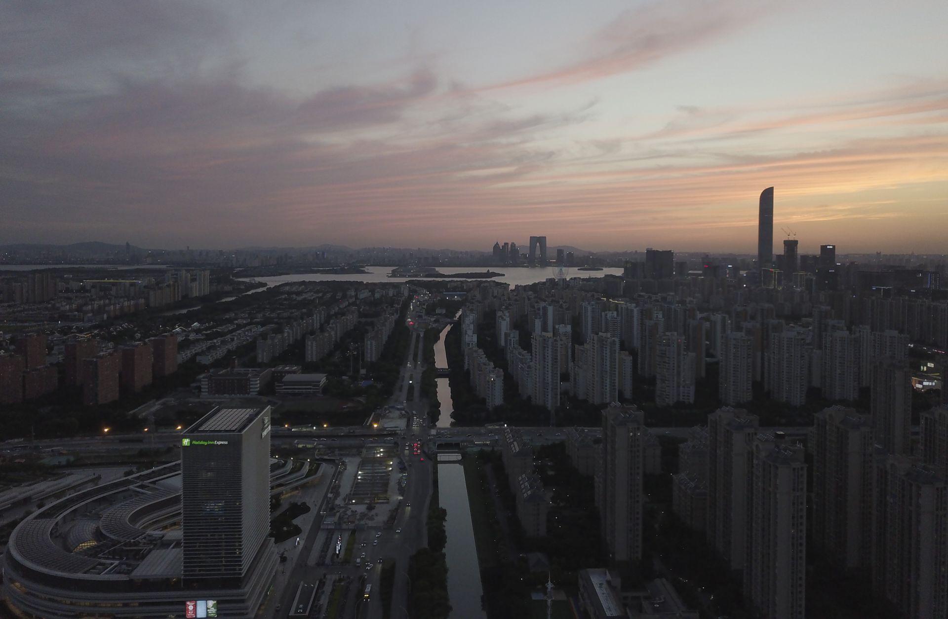 A photo taken on May 31, 2021, shows the skyline of Suzhou, China, at sunset. A photo taken on May 31, 2021, shows the skyline of Suzhou, China, at sunset.