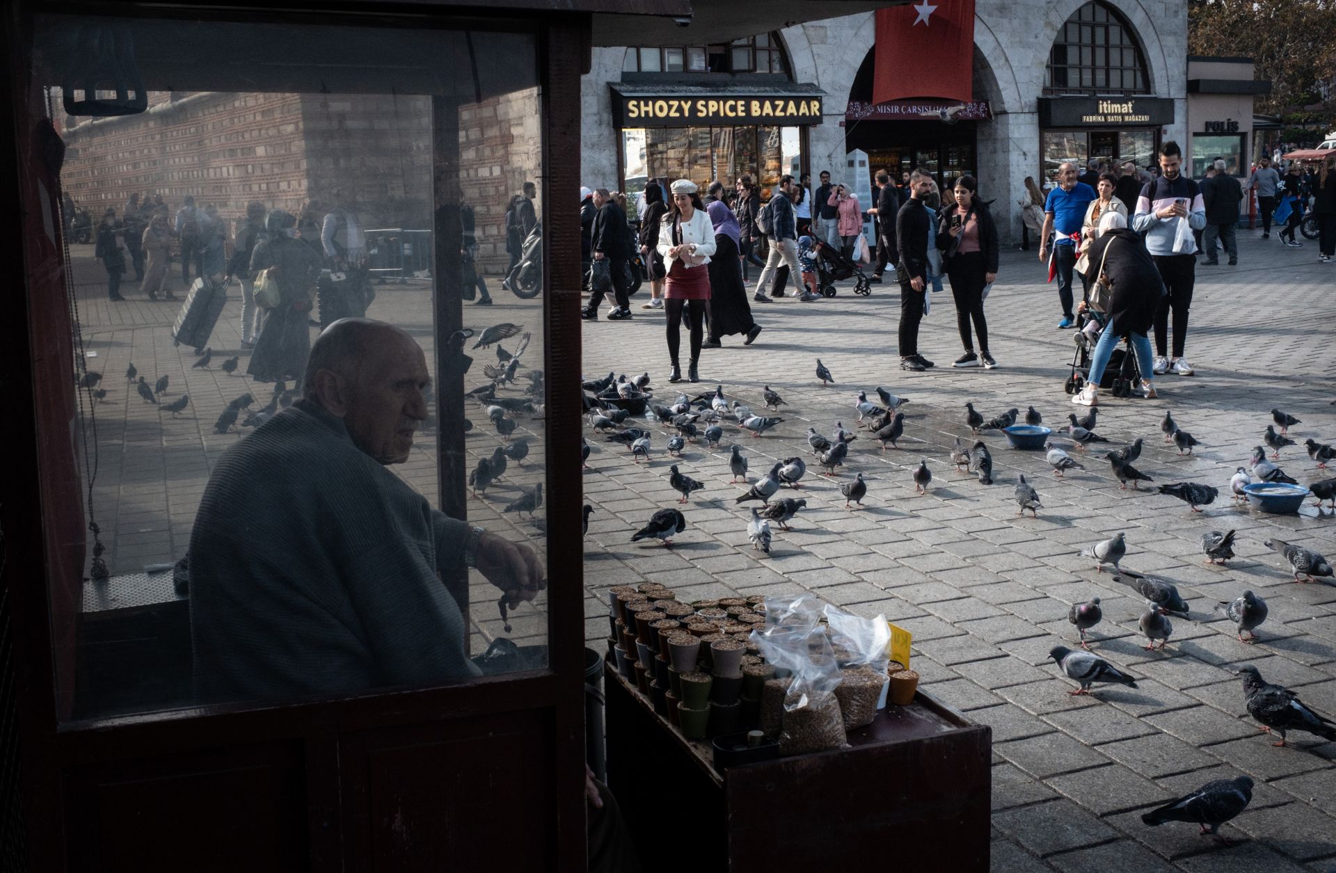 A man selling pigeon seed is seen outside Istanbul's Spice Bazaar on Nov. 3, 2022, after the Turkish government announced the country's official inflation rate had hit a 25-year high of 85.5% in October. 