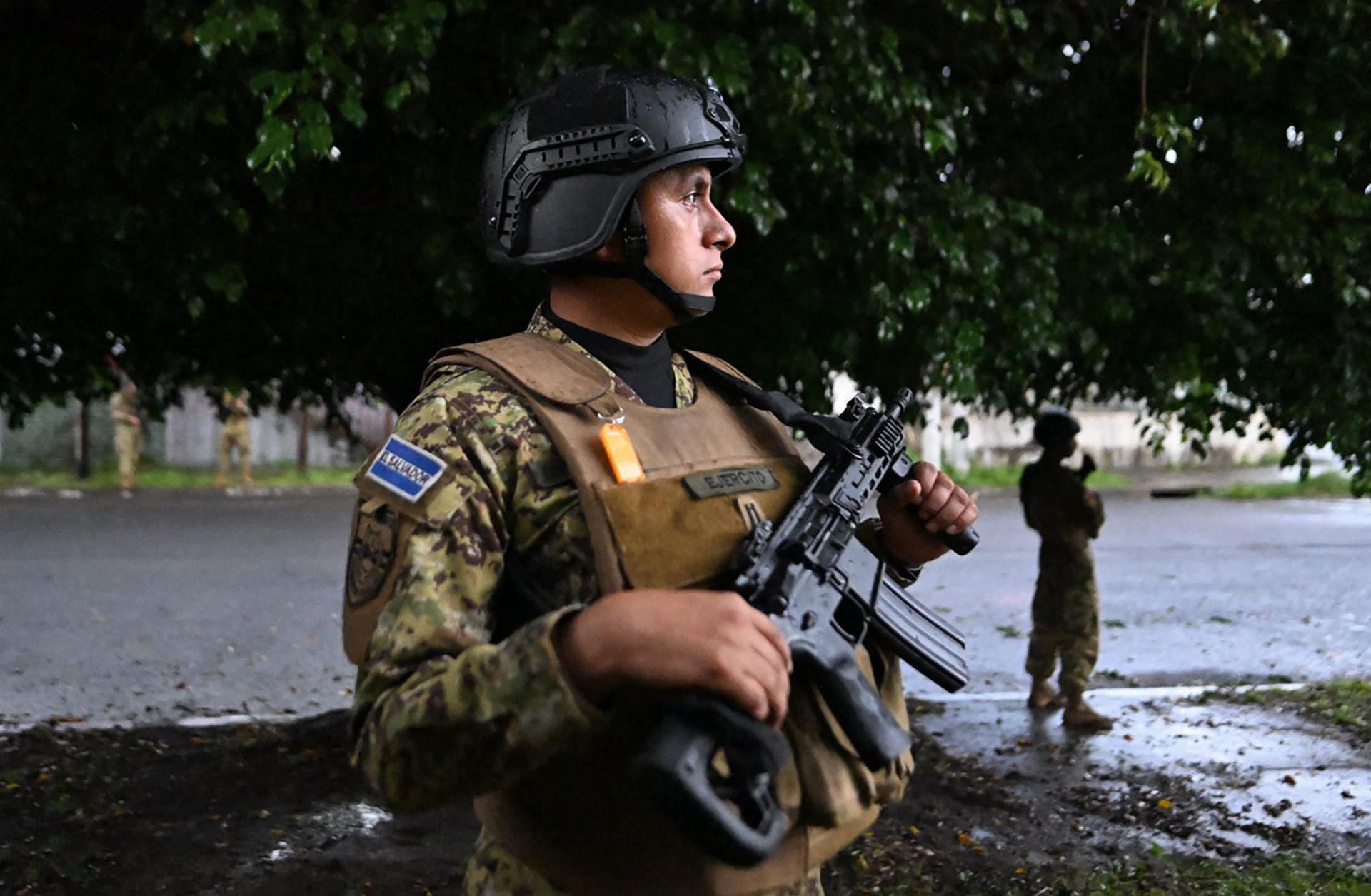 Soldiers conduct a patrol on July 22, 2023, in the Salvadorean municipality of Colon, where the MS-13 gang reportedly remains active. 