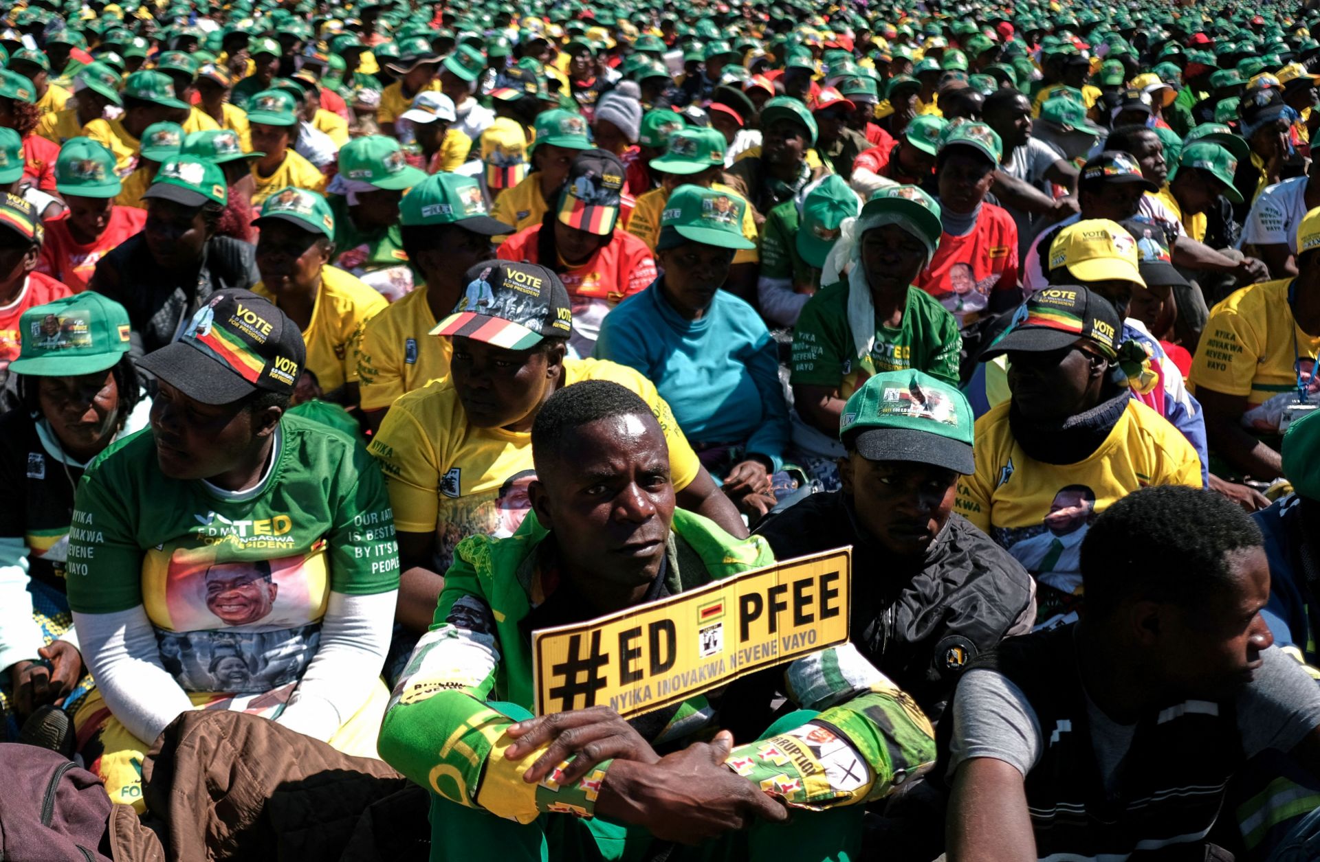 Supporters of Zimbabwe's ruling ZANU-PF party attend a campaign rally in Harare, Zimbabwe on Aug. 9, 2023. 