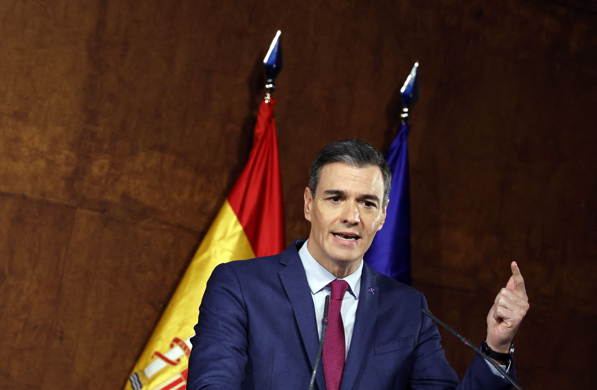 Spain's acting Prime Minister Pedro Sanchez speaks in Madrid after signing an agreement to form a coalition government on Oct. 24, 2023. 