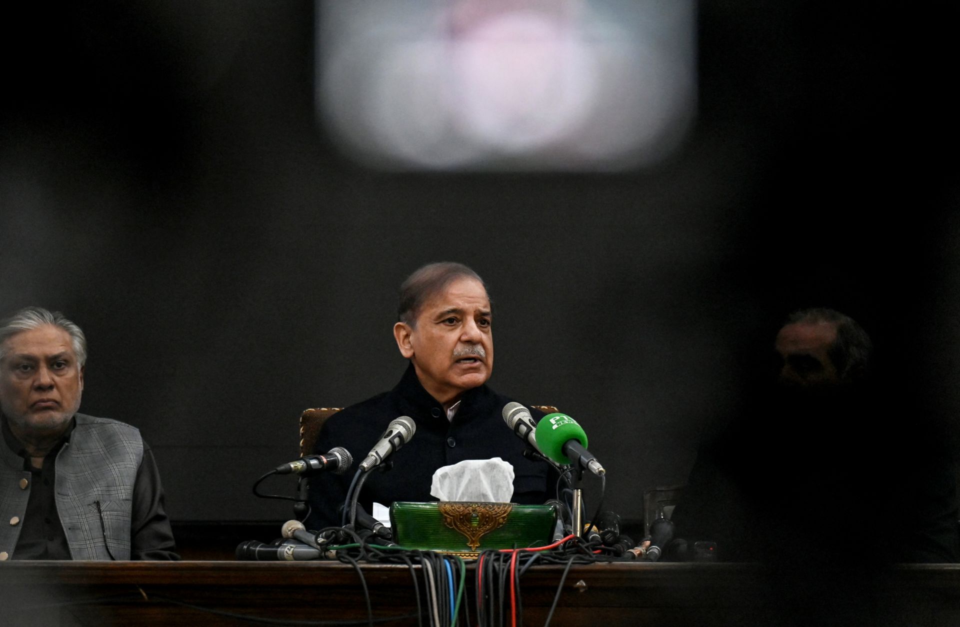 Former Pakistani Prime Minister and leader of the Pakistan Muslim League-Nawaz (PML-N) party, Shehbaz Sharif (center) speaks during a press conference in Lahore on Feb. 13, 2024. 