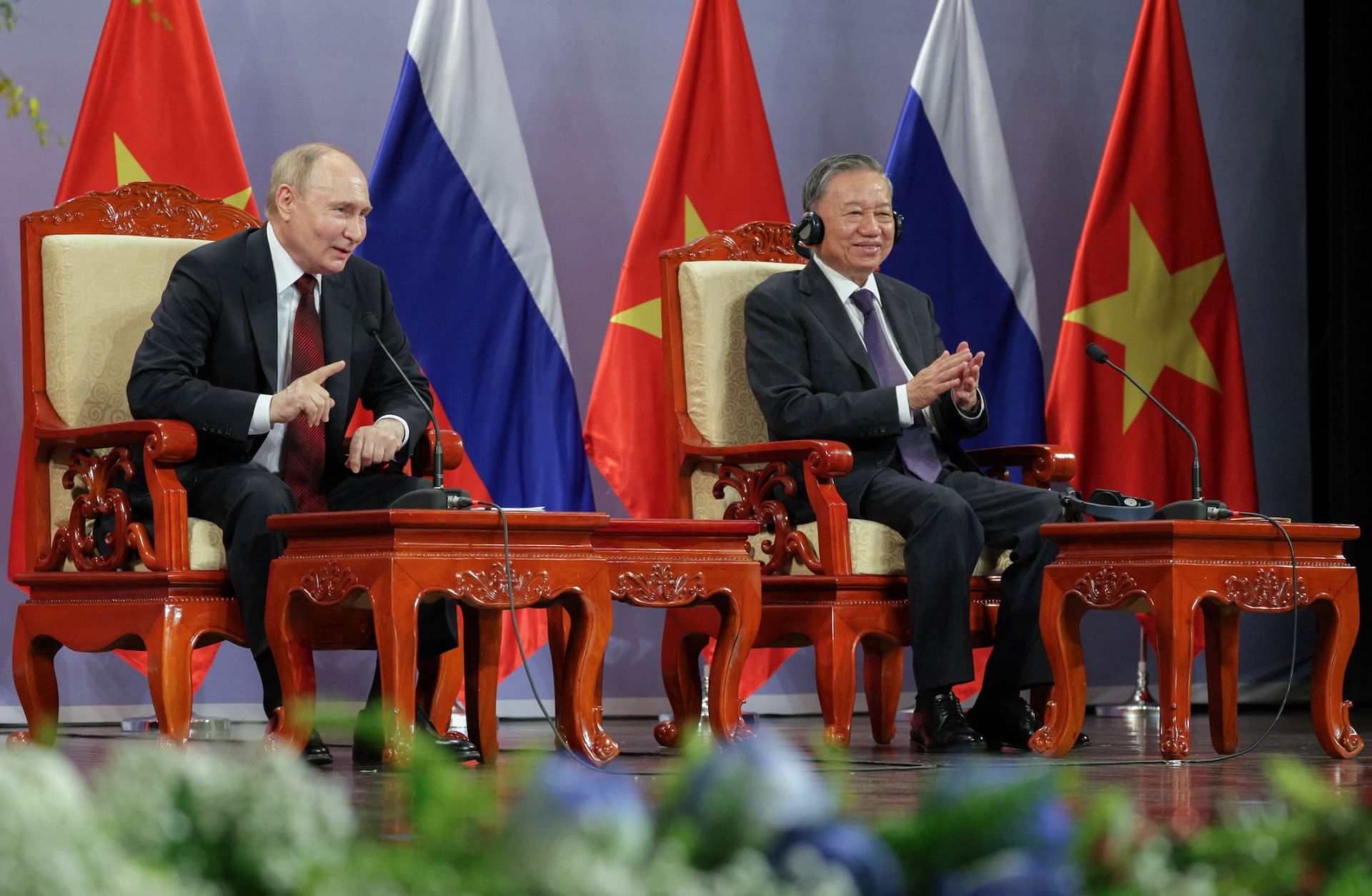 Russian President Vladimir Putin (left) and Vietnamese President To Lam attend an event in Hanoi, Vietnam, on June 20, 2024. 
