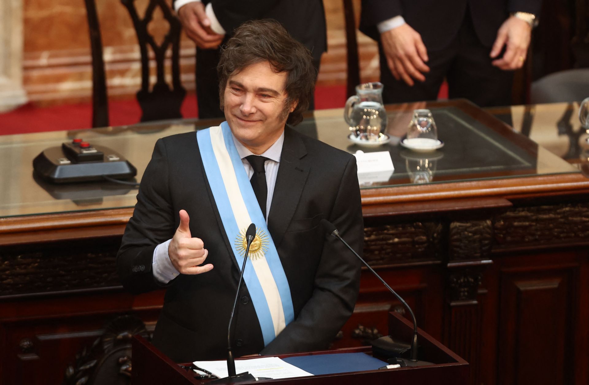 Argentine President Javier Milei gestures before presenting the 2025 budget proposal to Congress in Buenos Aires on Sept. 15, 2024. 