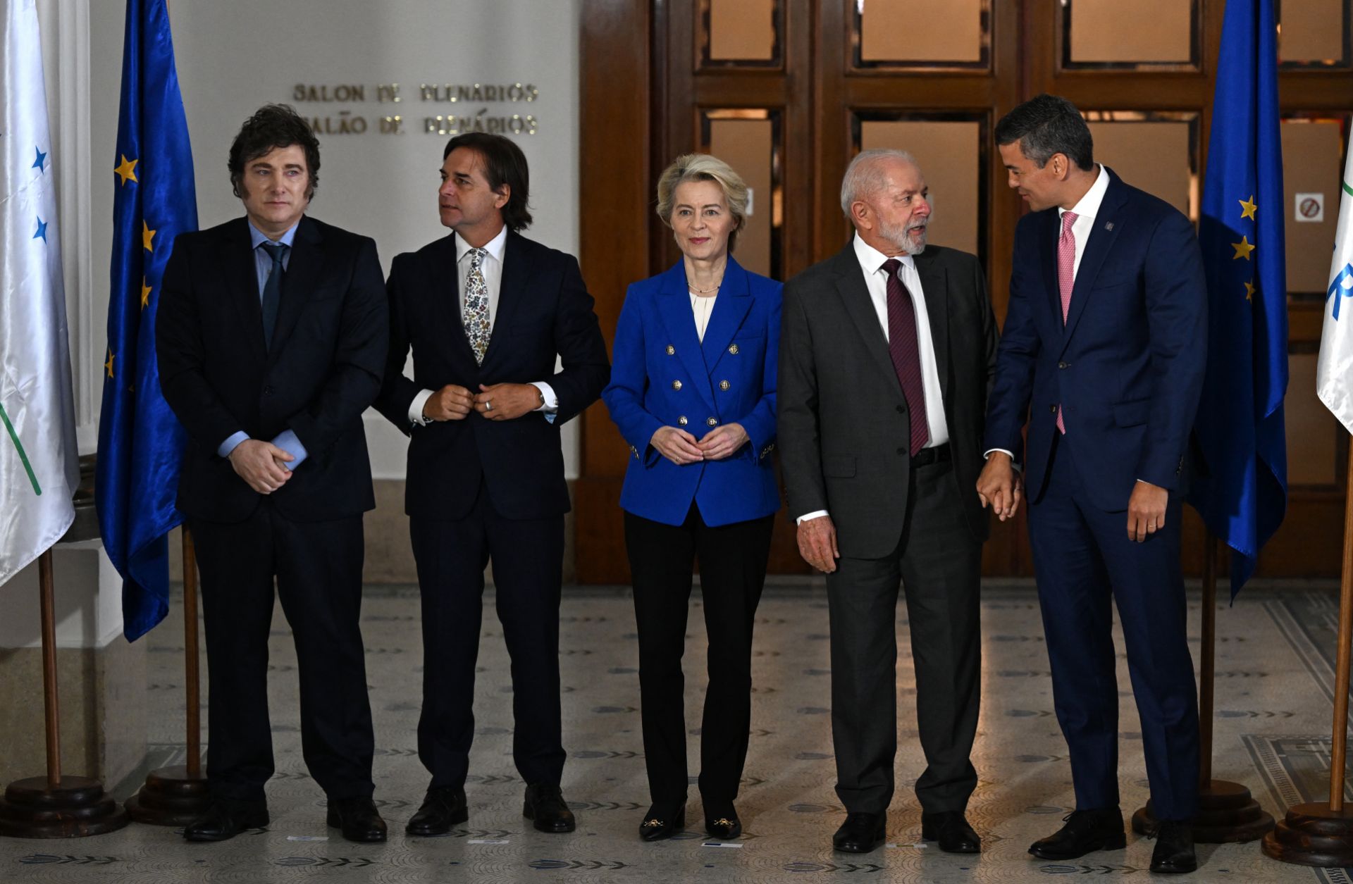 (From left to right) Argentine President Javier Milei, Uruguayan President Luis Lacalle Pou, European Commission President Ursula von der Leyen, Brazilian President Luiz Inacio Lula da Silva and Paraguayan President Santiago Pena pose for a photo during the Mercosur summit in Montevideo on Dec. 6, 2024. 