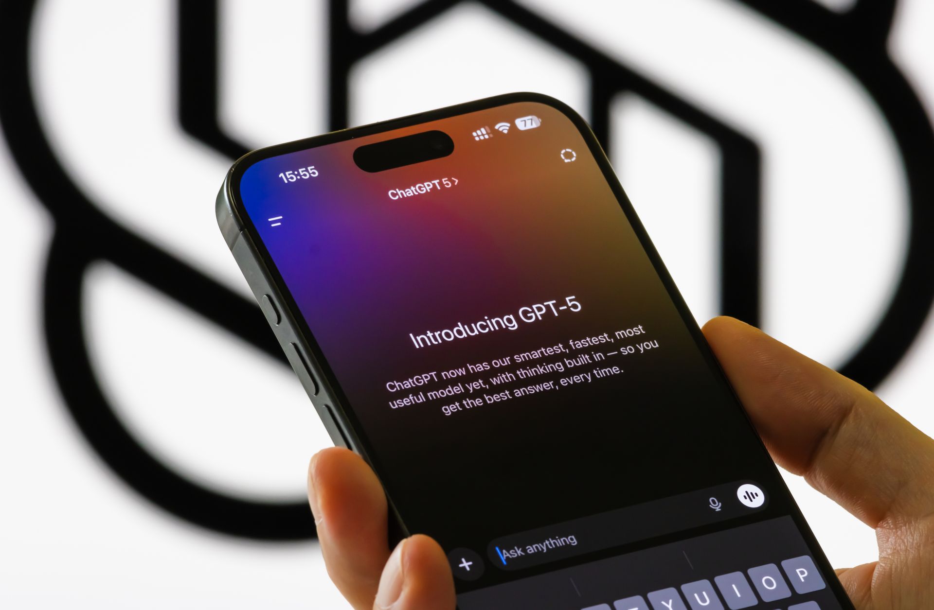 A person holds a smartphone showing an interface introducing OpenAI's new GPT-5 model in the ChatGPT app in front of a blurred OpenAI logo on Aug. 9, 2025, in Chongqing, China. A person holds a smartphone showing an interface introducing OpenAI's new GPT-5 model in the ChatGPT app in front of a blurred OpenAI logo on Aug. 9, 2025, in Chongqing, China.